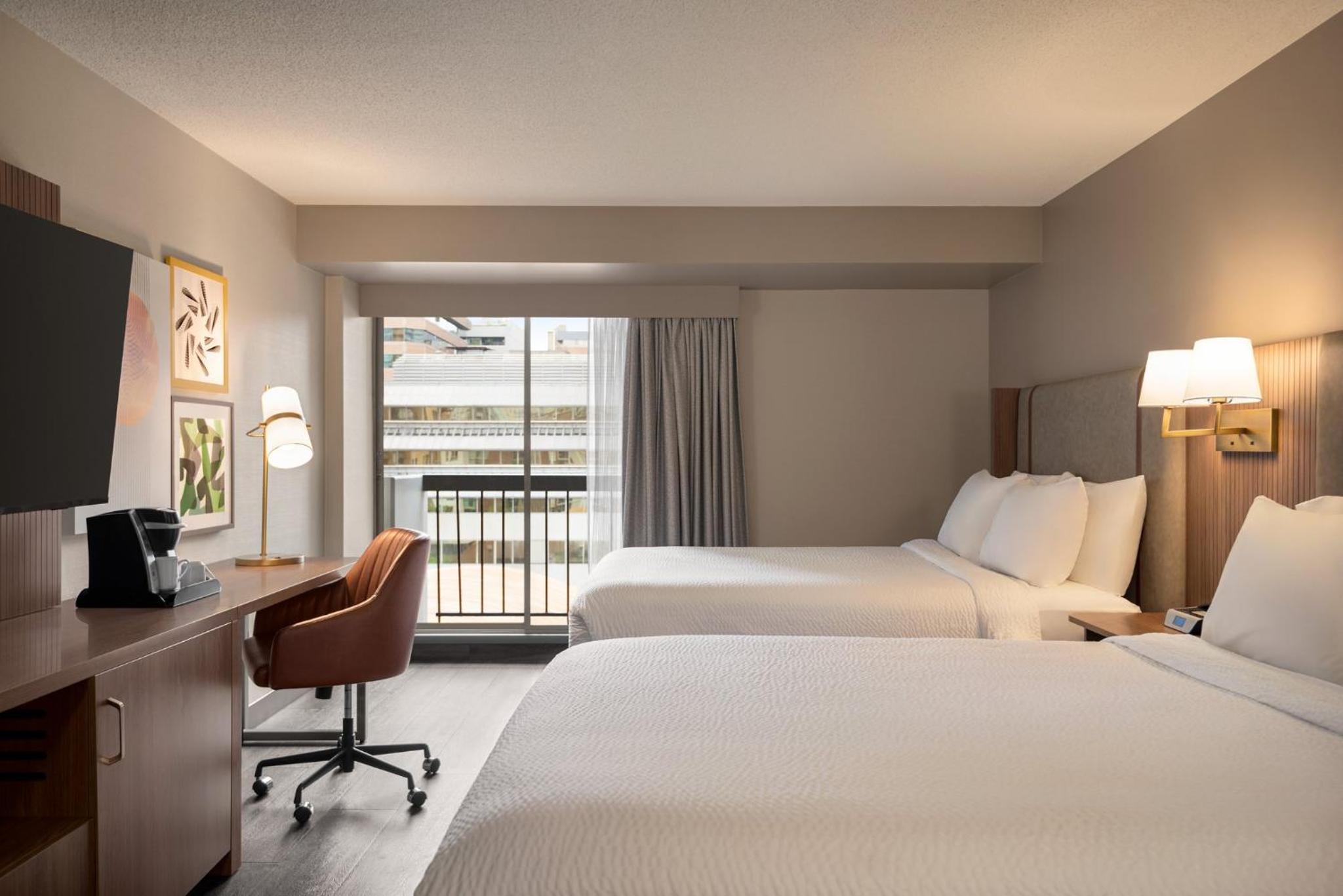Standard Queen Room with Two Queen Beds and Balcony - Photo 2