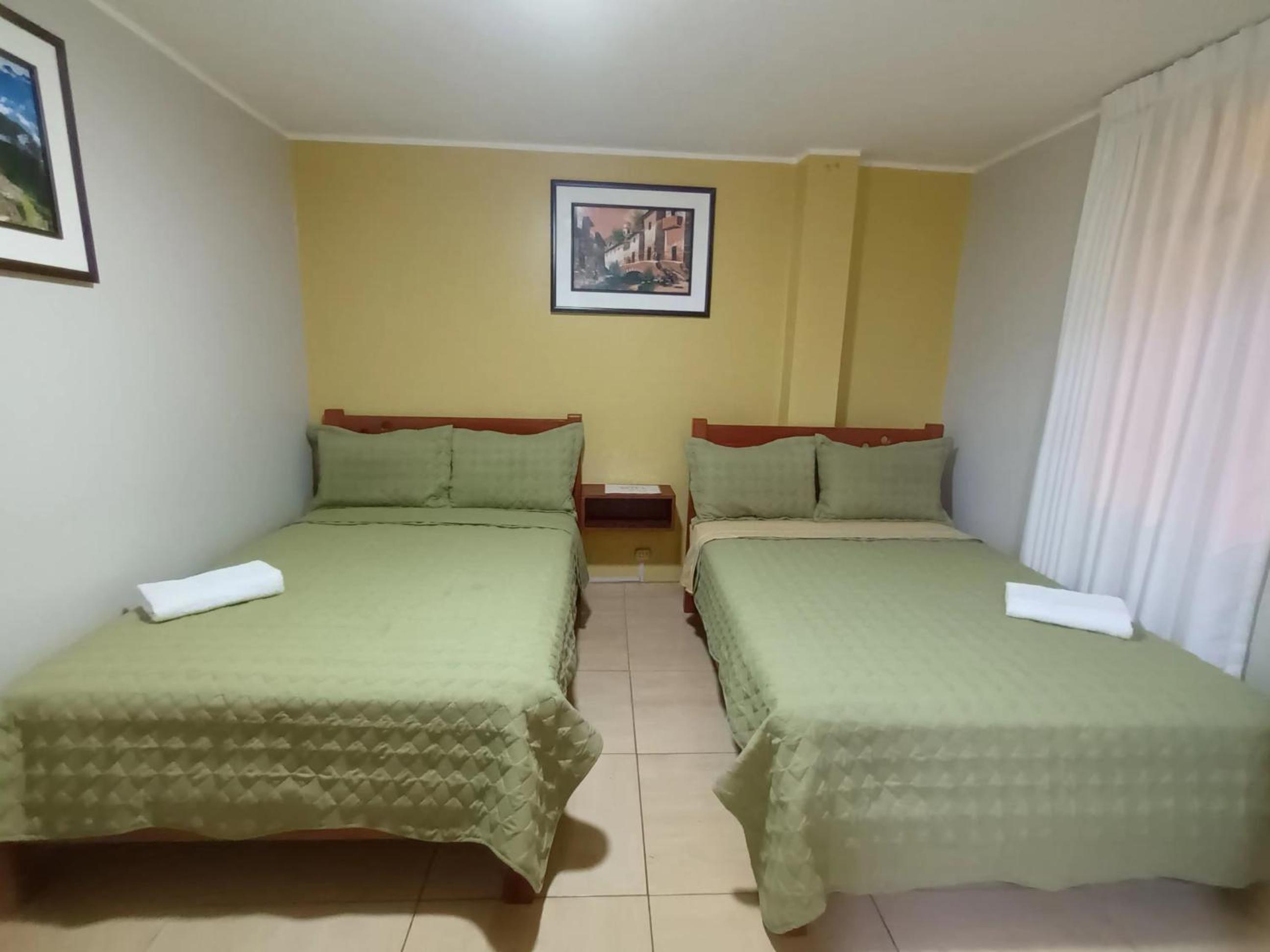 Economy Quadruple Room with Shared Bathroom
