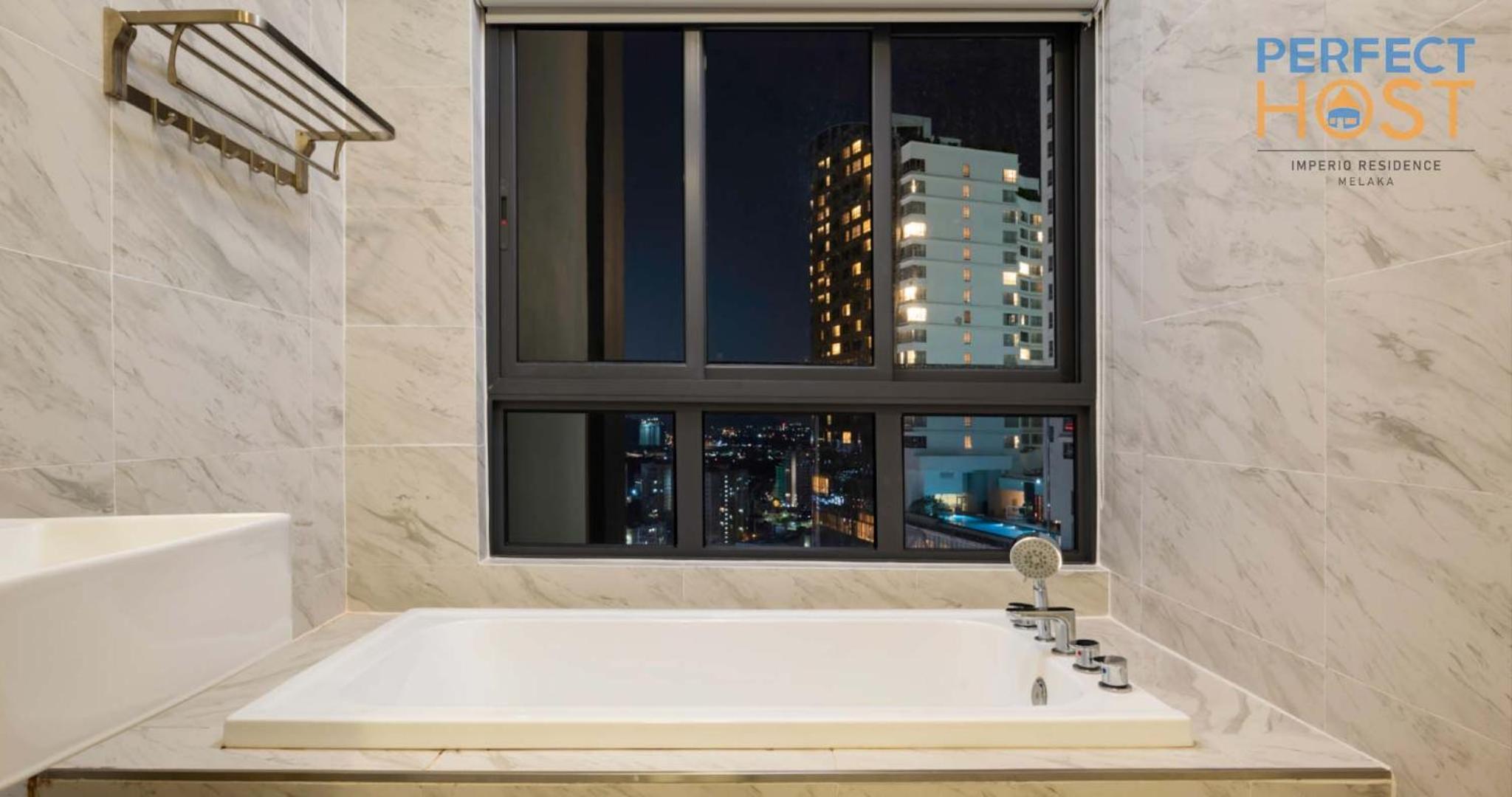 Studio Twin Room with City View at Imperio Residence Seafront by Perfect Host