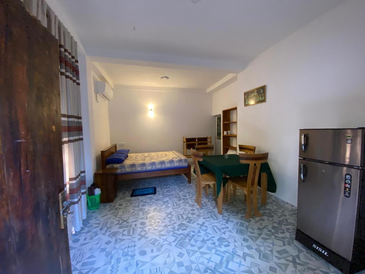 Triple Room with Garden View photo 2