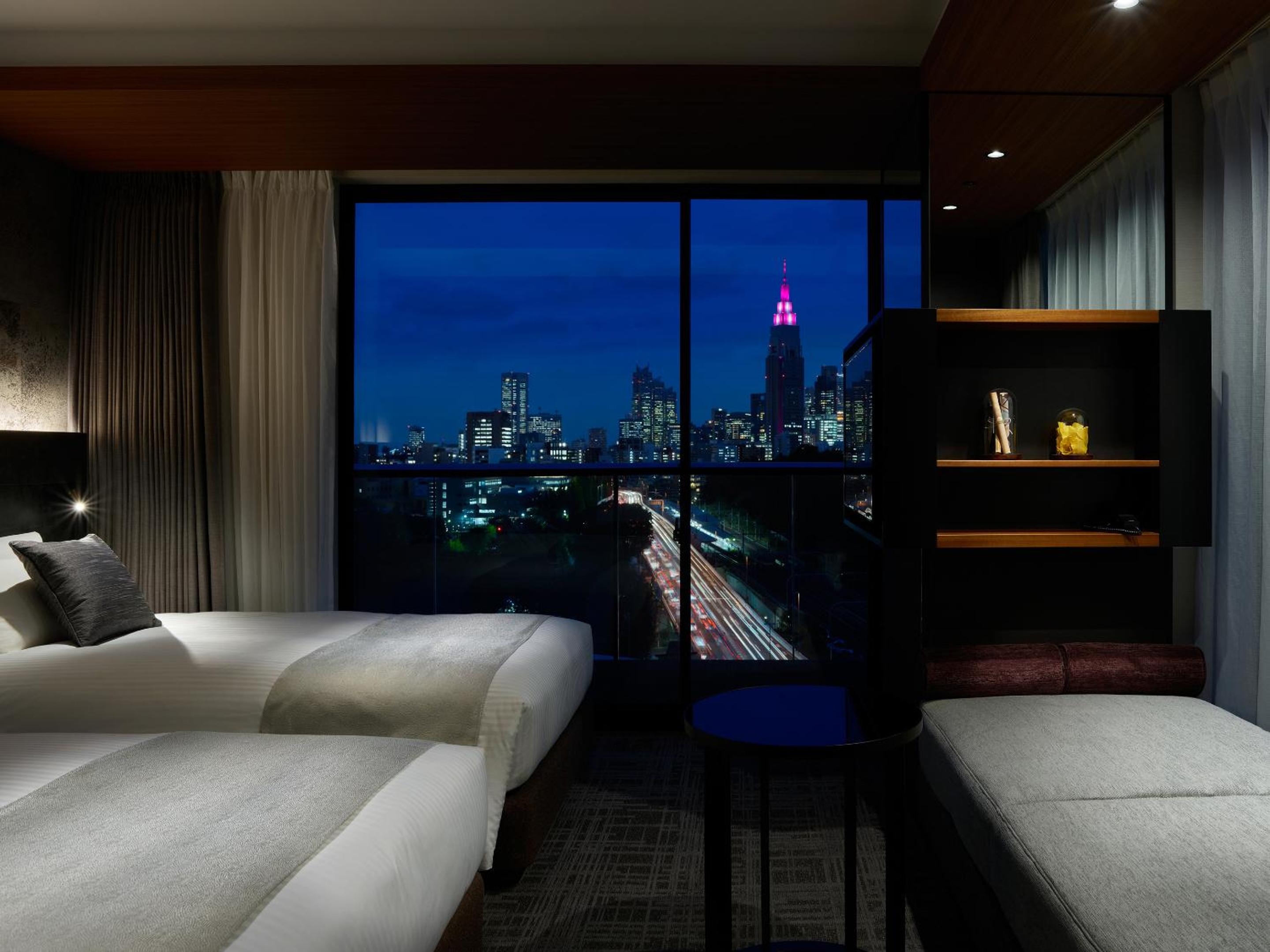 Superior Corner Twin Room with Balcony