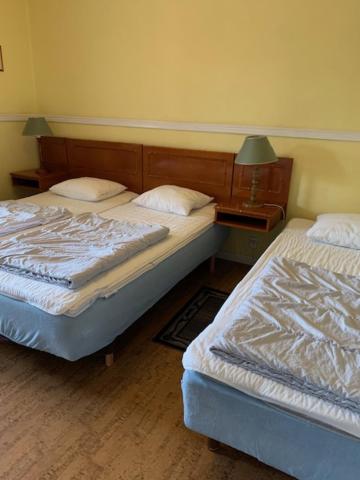 Basic Triple Room with Shared Bathroom photo 2