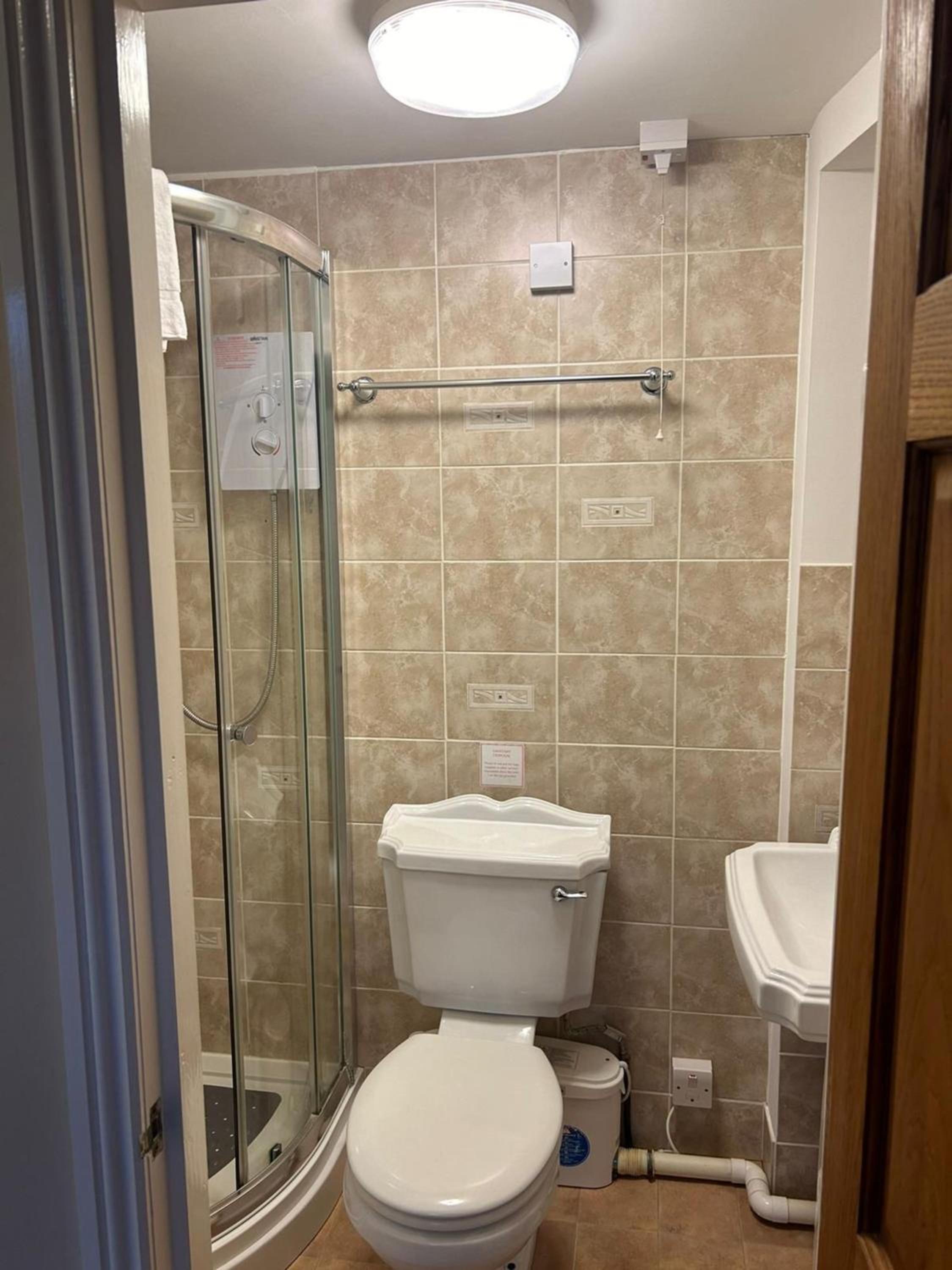 Single Room with Bathroom Outside of Room photo 2
