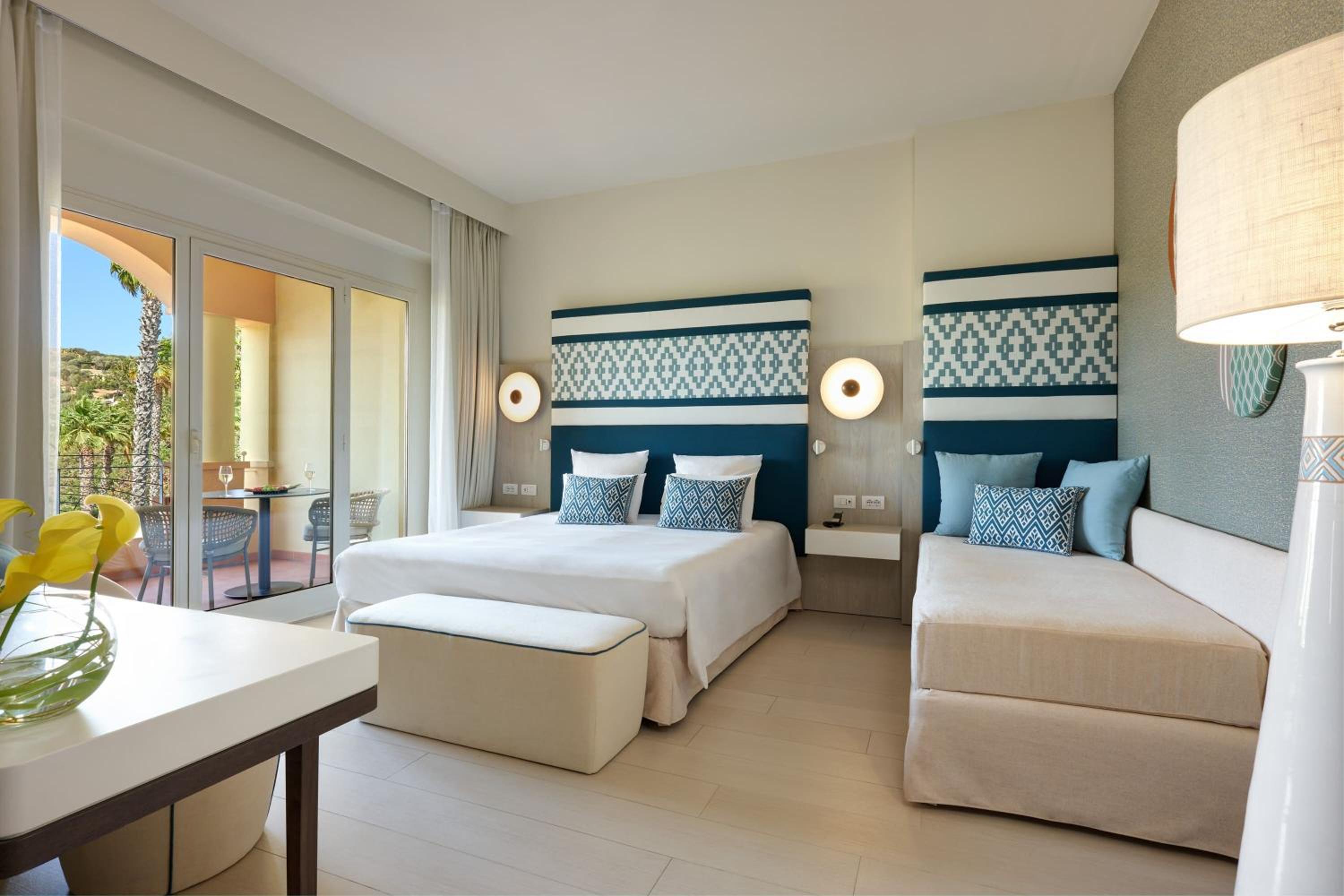 Deluxe Triple Room with Garden View - Photo 1