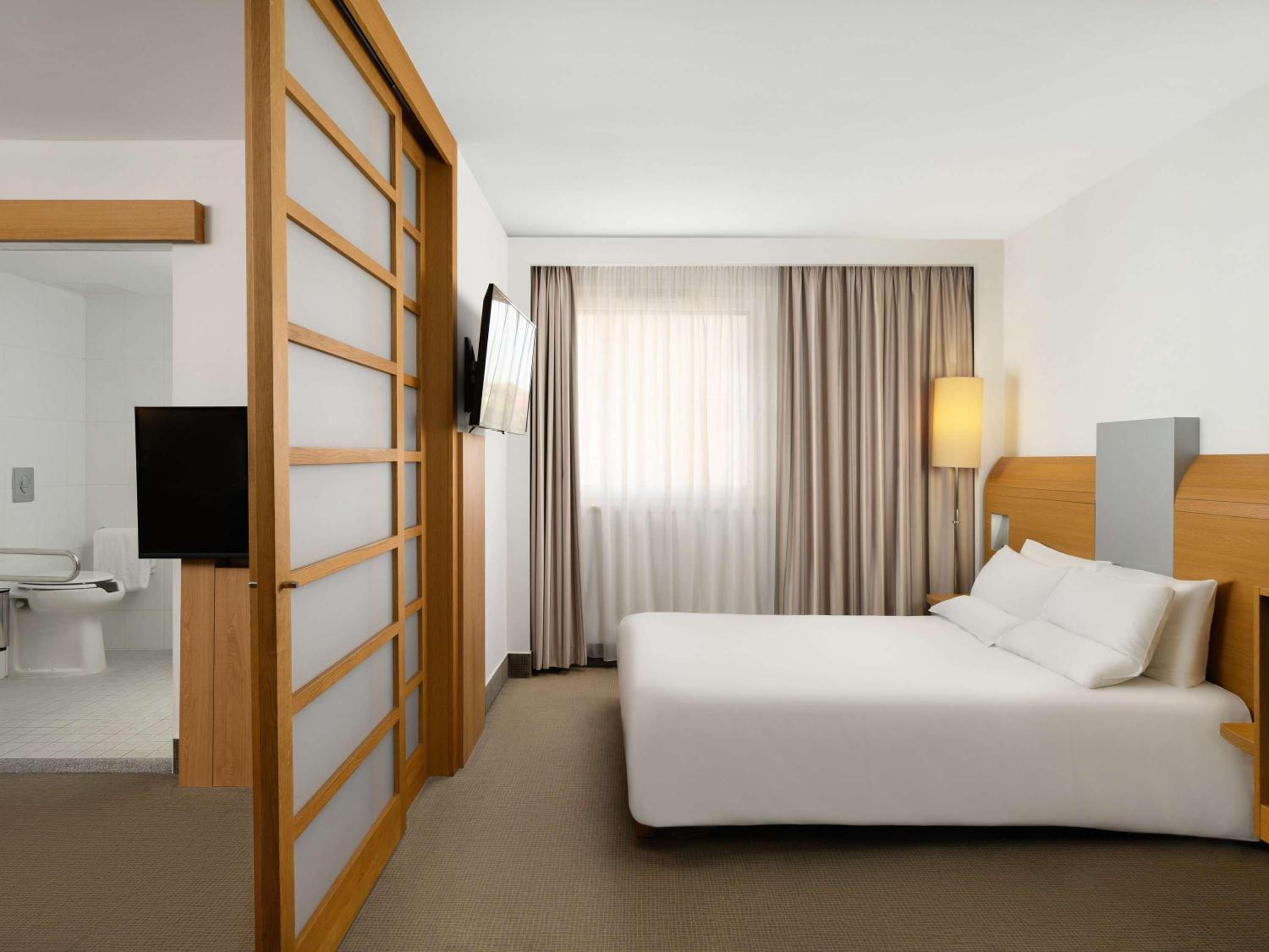 Accessible Standard Room With One Double Bed And One Sofa