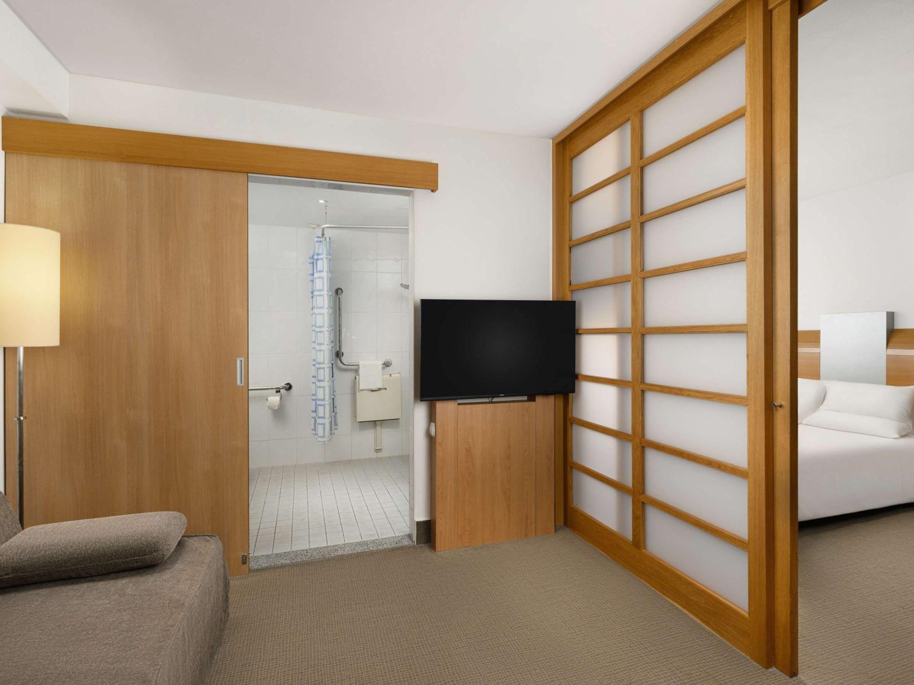 Accessible Standard Room With One Double Bed And One Sofa