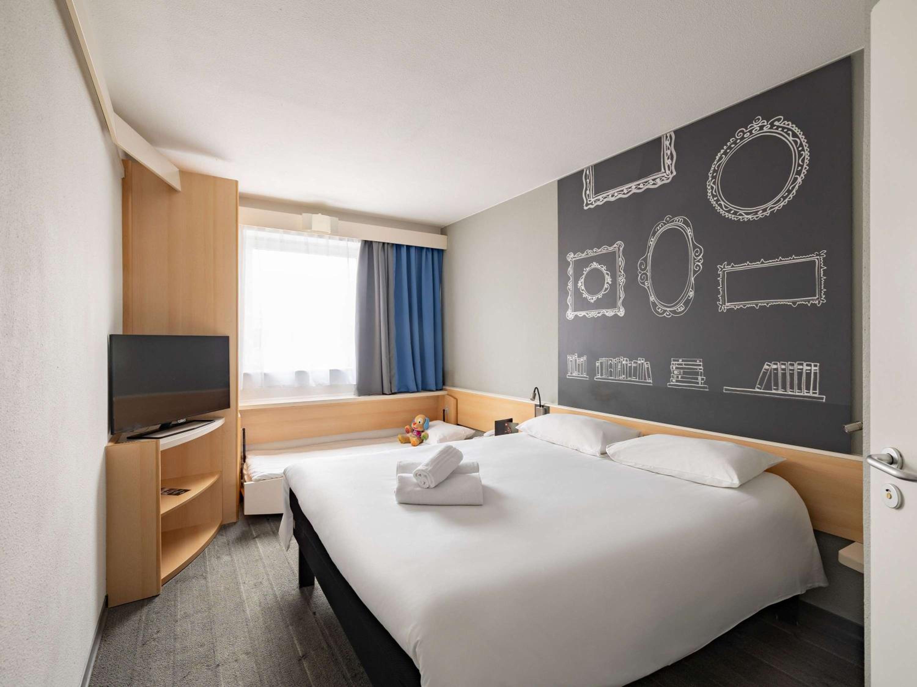 Standard Family Room with One Double Bed and One Single Bed - Photo 1