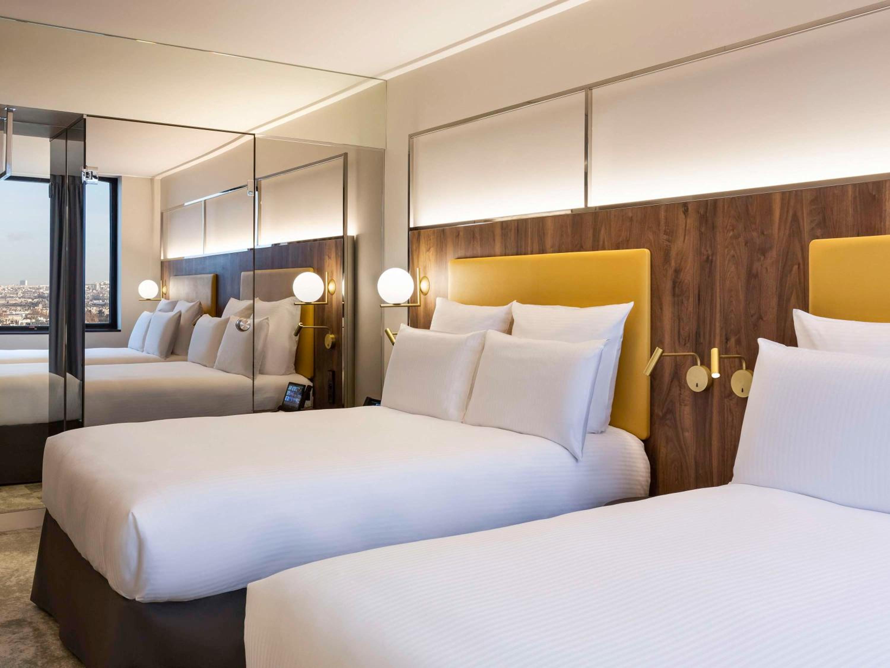 Deluxe Family Room with 2 Double Beds and view on Paris