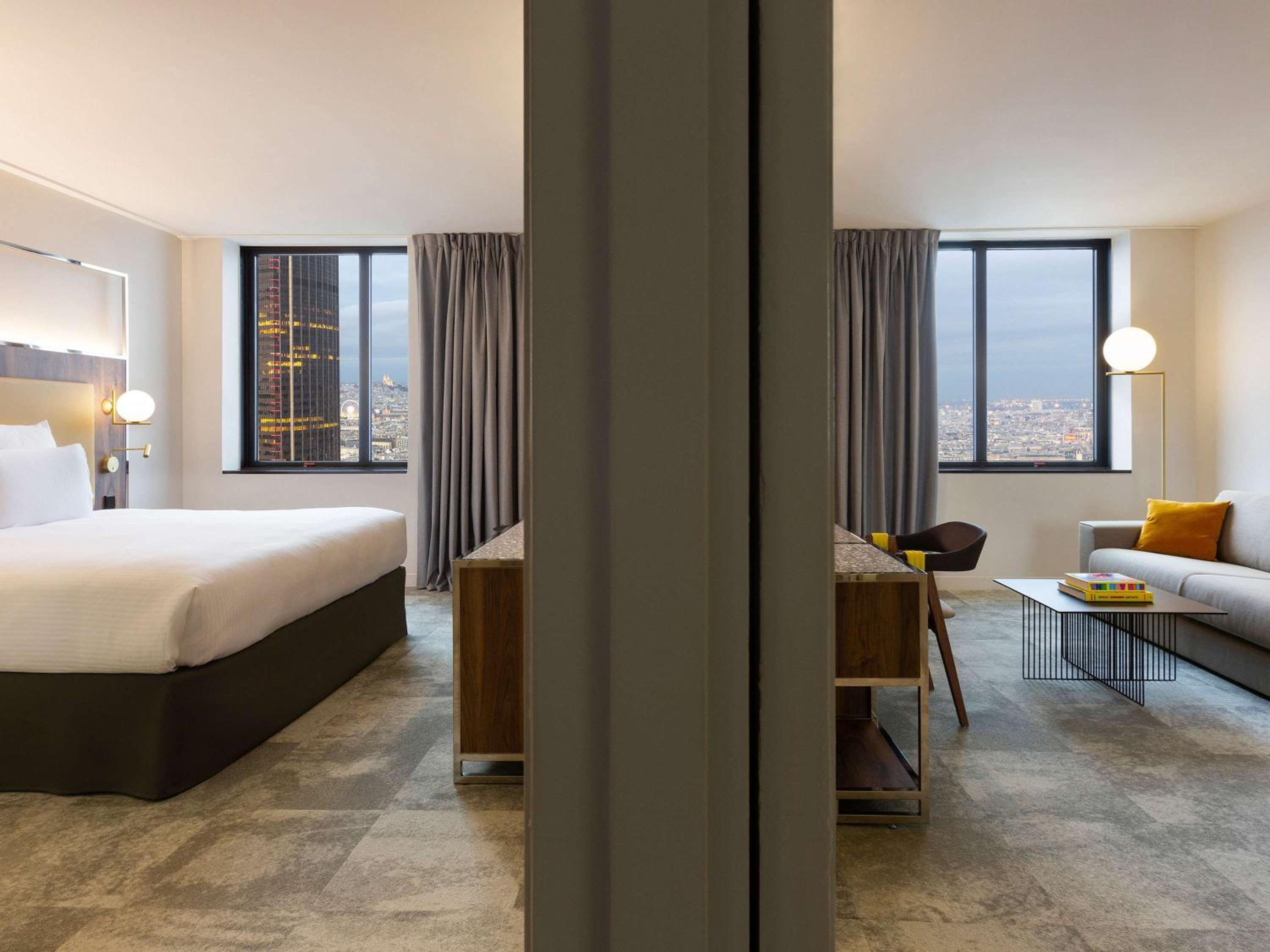Deluxe Suite with one King Size Bed and one Sofa with City View