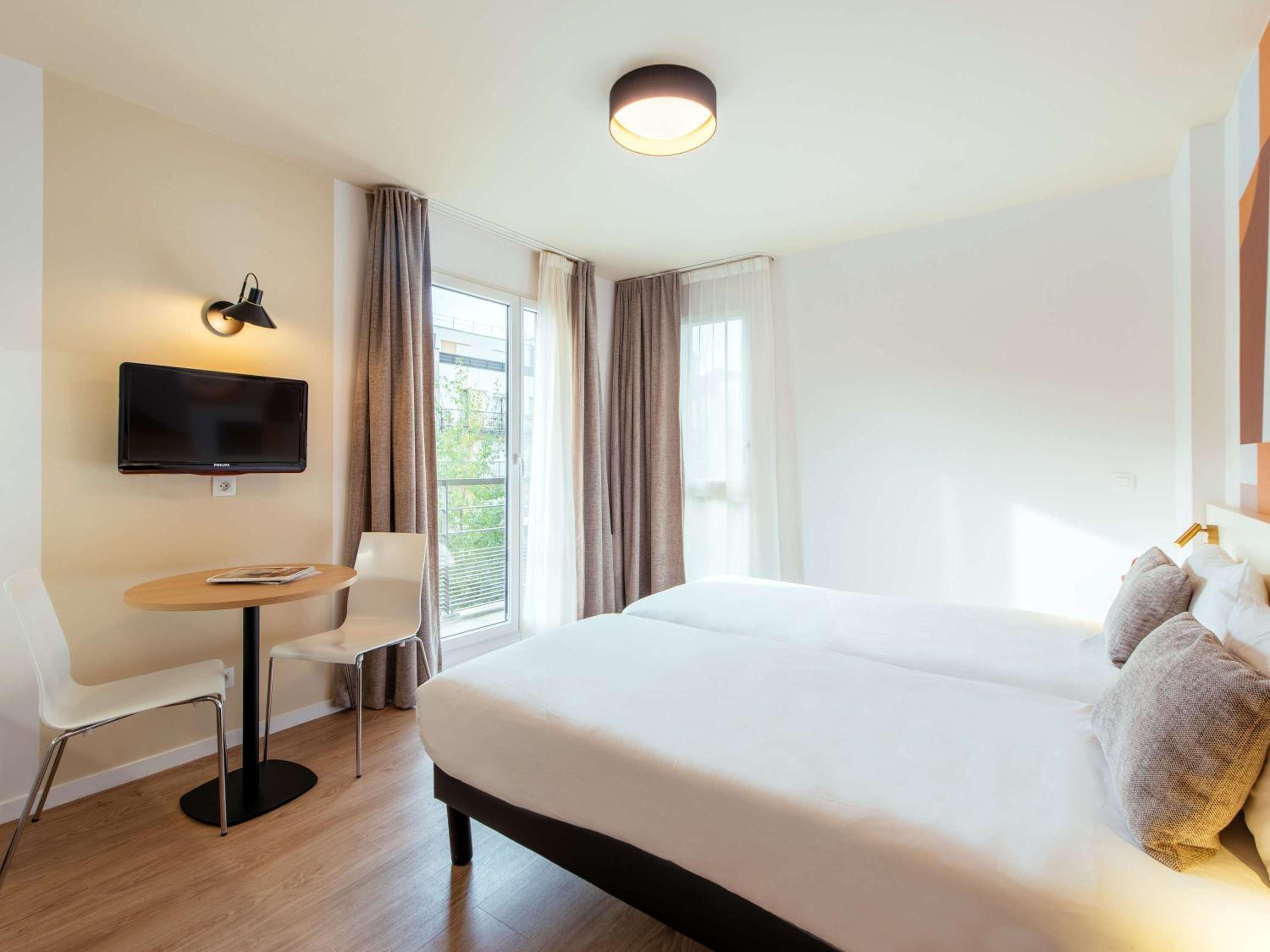 Small Studio with Twin Beds - Photo 1