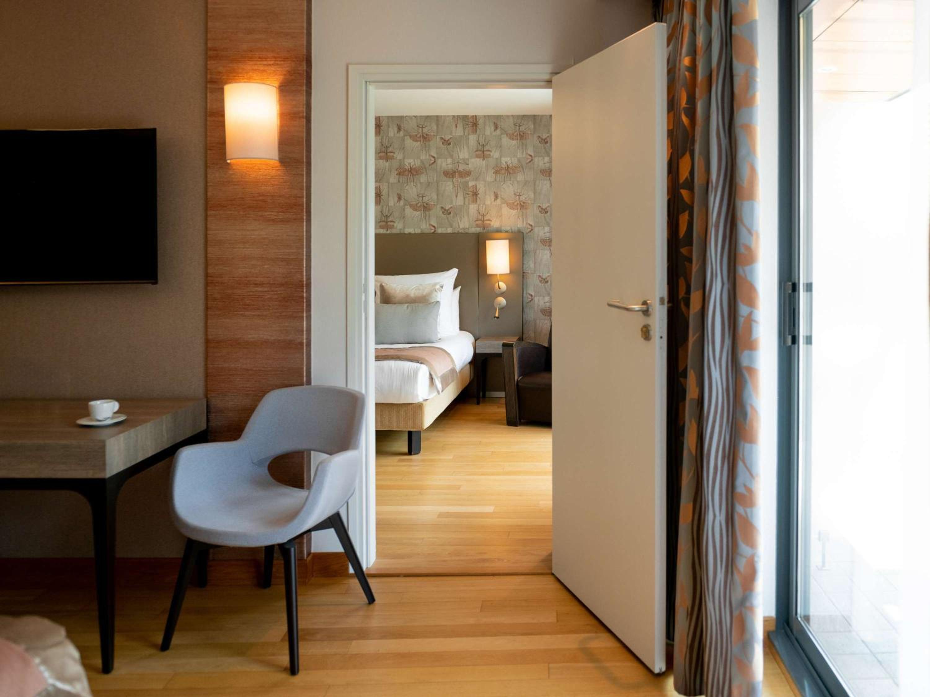 Suite Familiale Supérieure – 2 Chambres Communicantes – Côté Jardin Suite Familiale Supérieure – 2 Chambres Communicantes – Côté Jardin