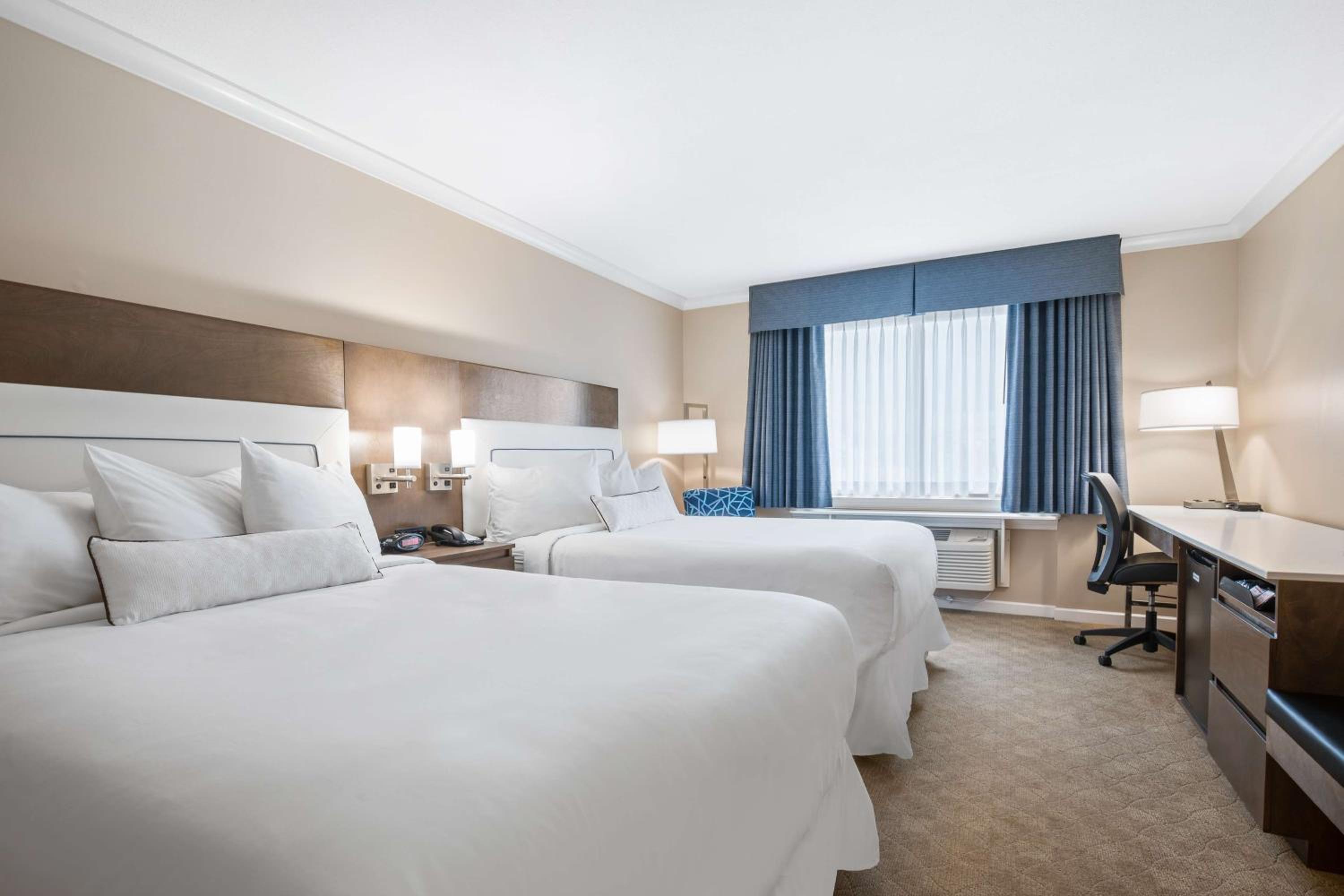 Queen Room with Two Queen Beds - Photo 1