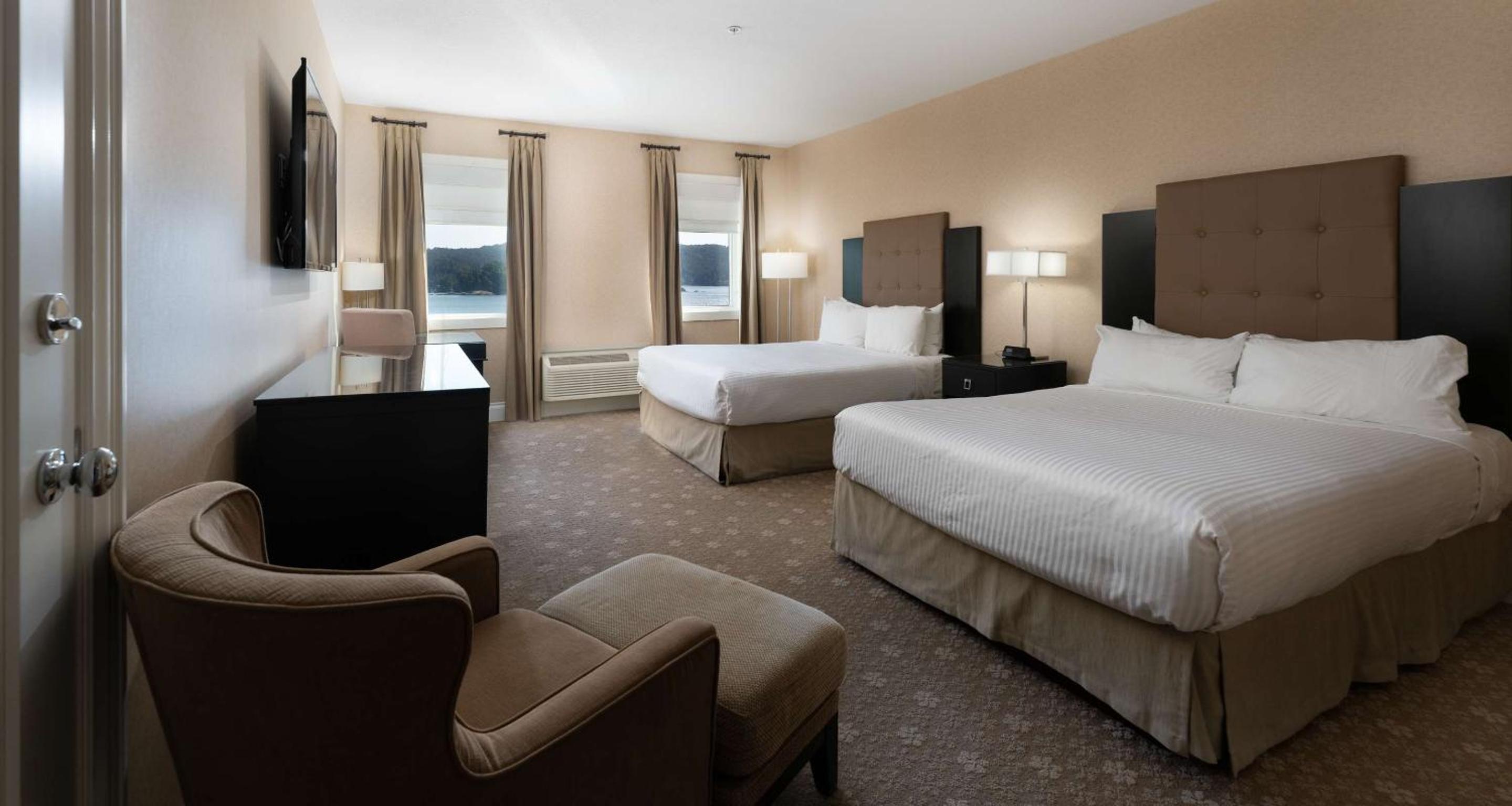 Queen Room with Two Queen Beds and Premium Water View - Photo 1