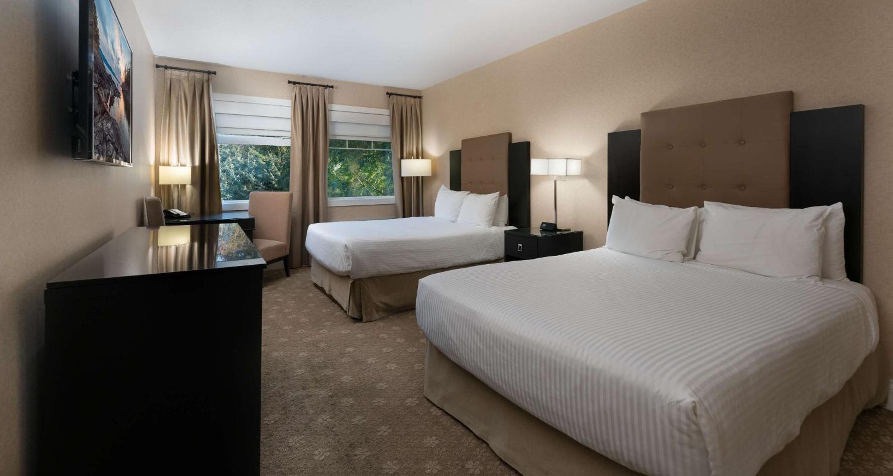 Queen Room with Two Queen Beds - Photo 1