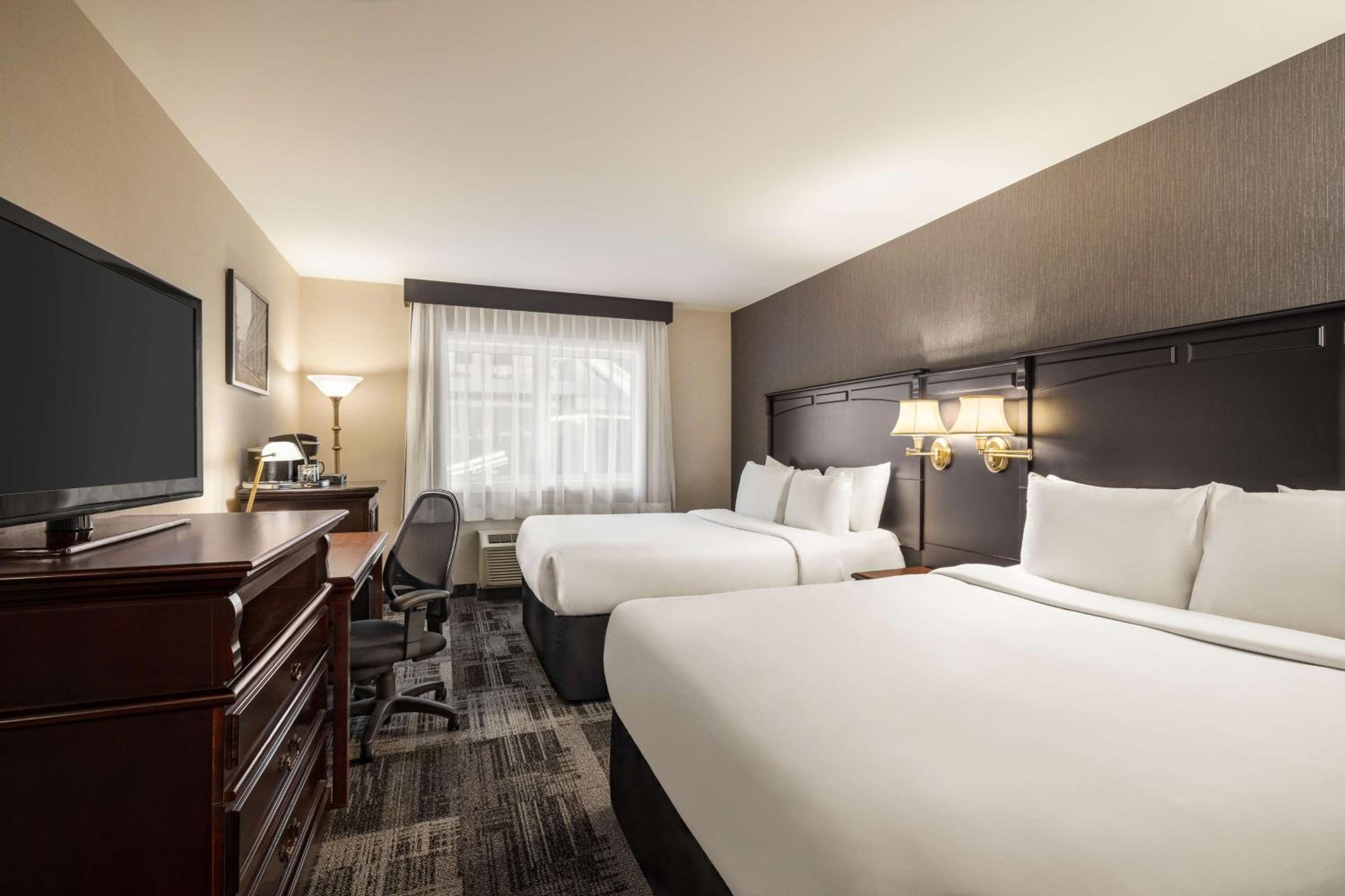 Queen Room with Two Queen Beds - Photo 1