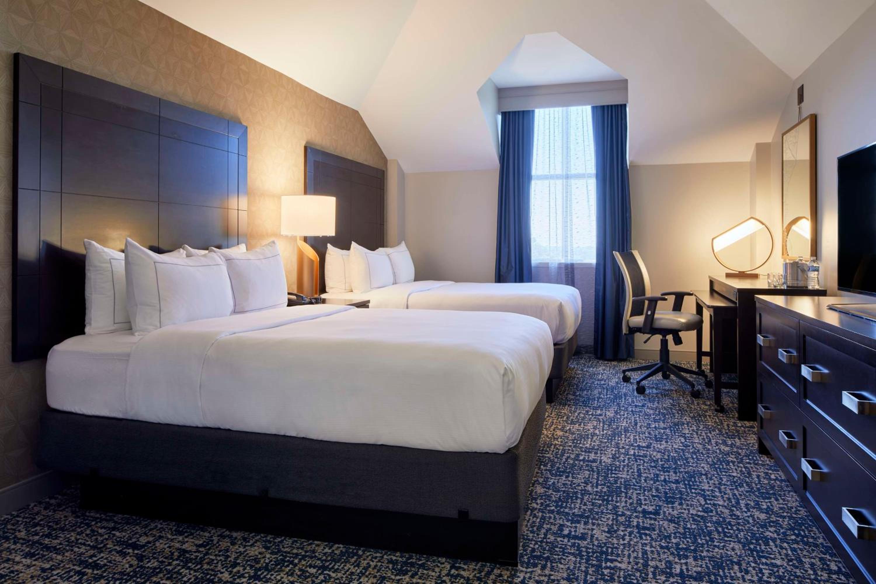 Standard Queen Room with Two Queen Beds - Photo 1