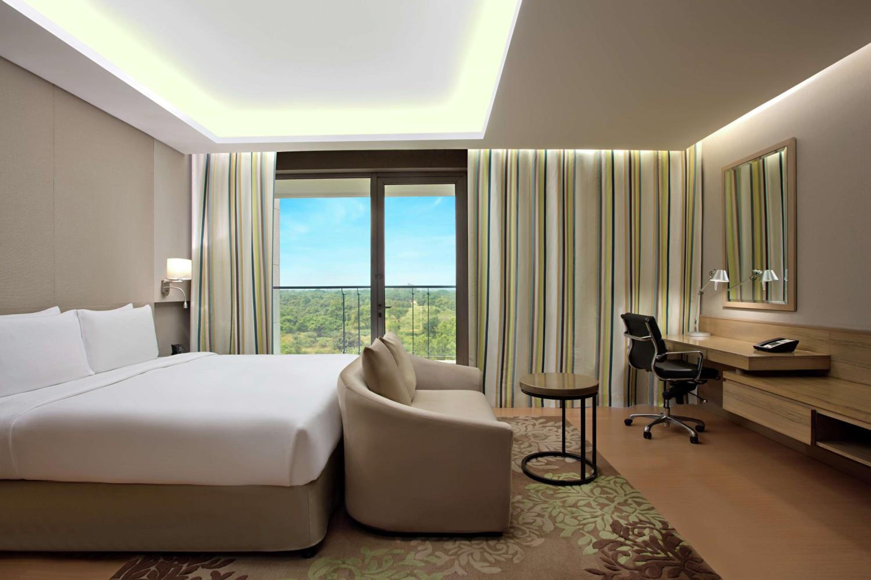 King Bed Deluxe Studio with Balcony photo 1