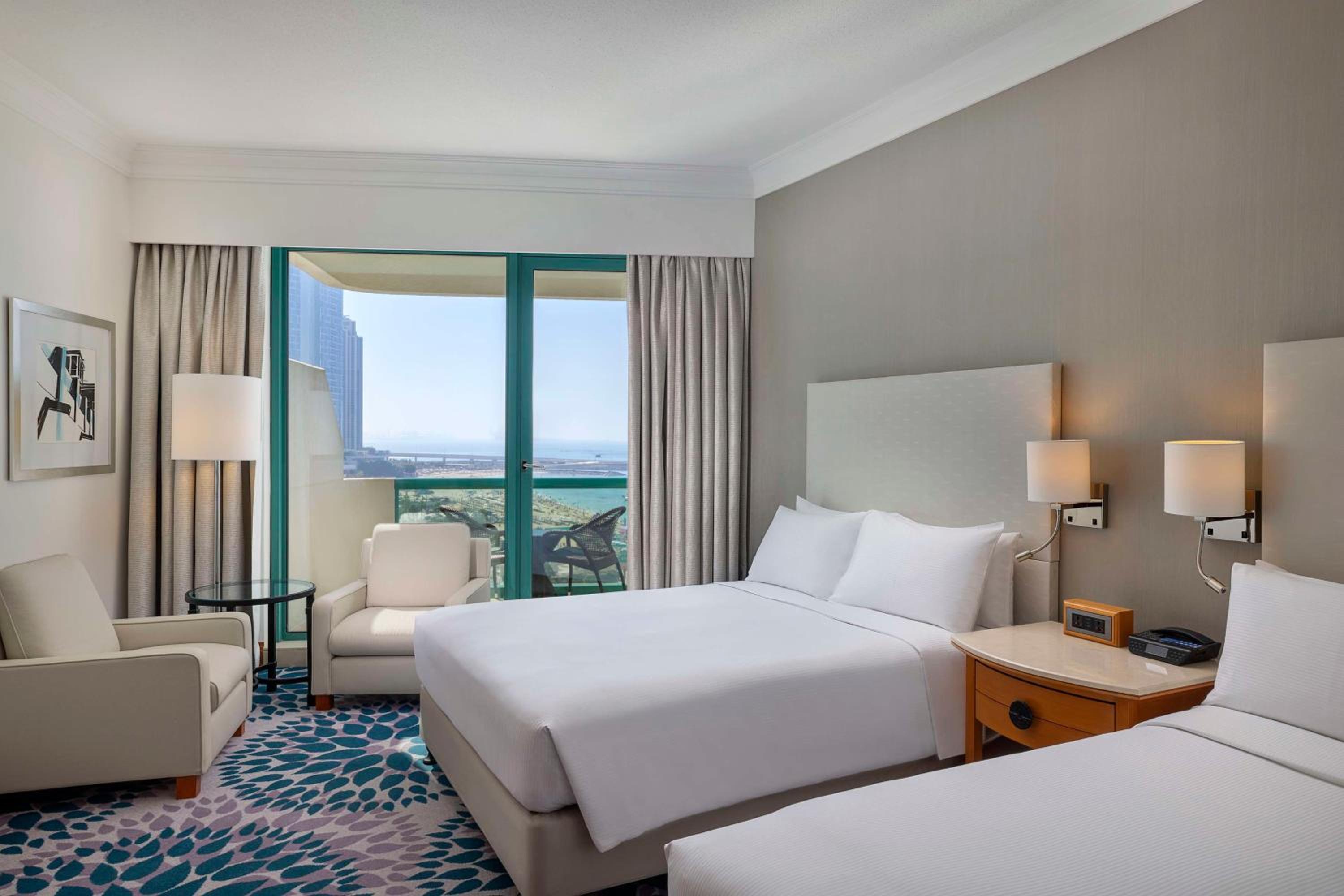Family Suite with Two Queen Beds and Partial Sea View