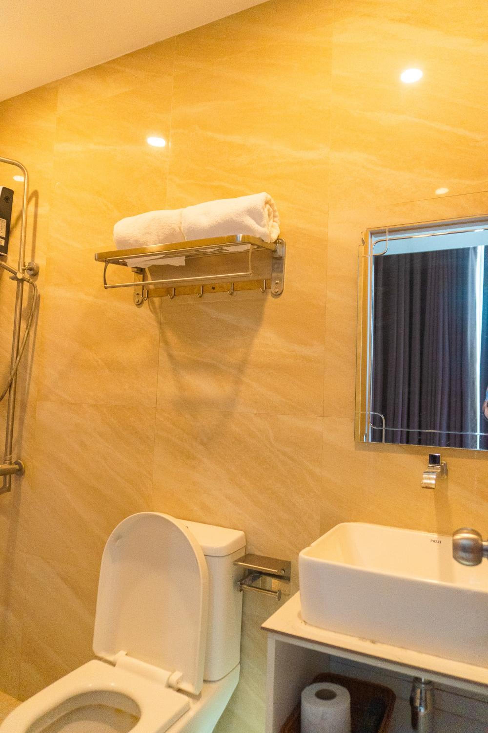 Deluxe Triple Room - Photo 7