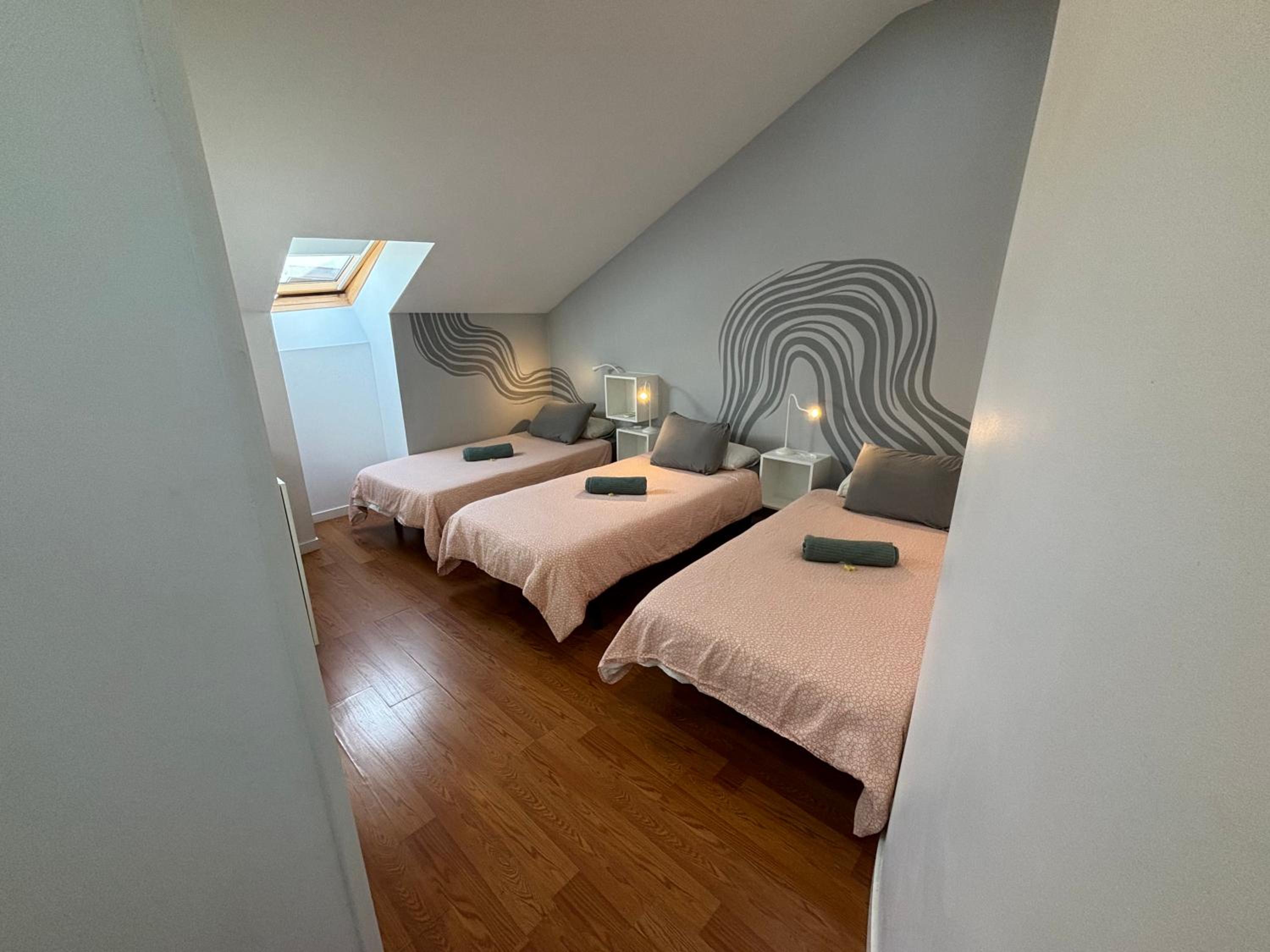 Habitación triple con baño