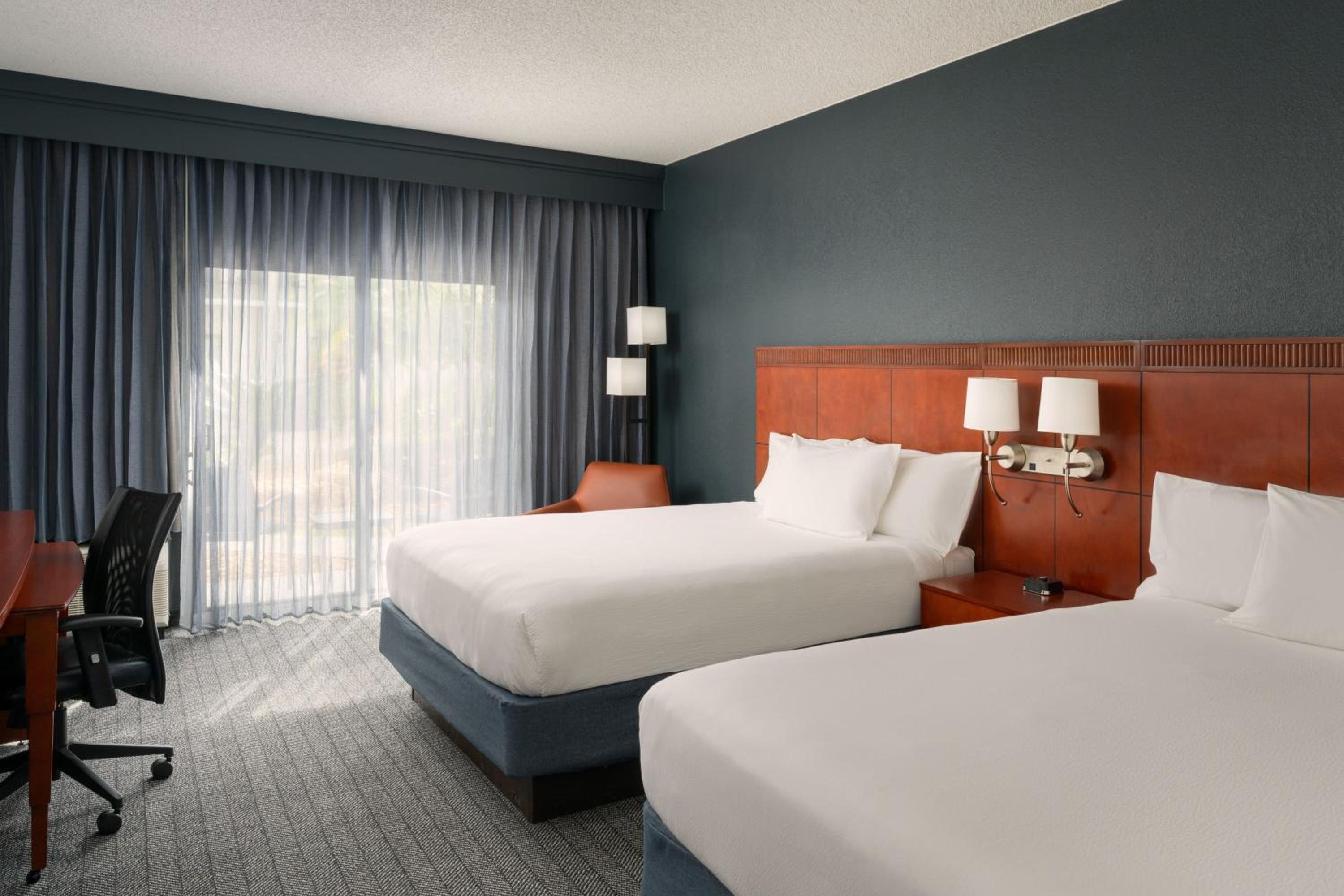 Queen Room with Two Queen Beds - Photo 1