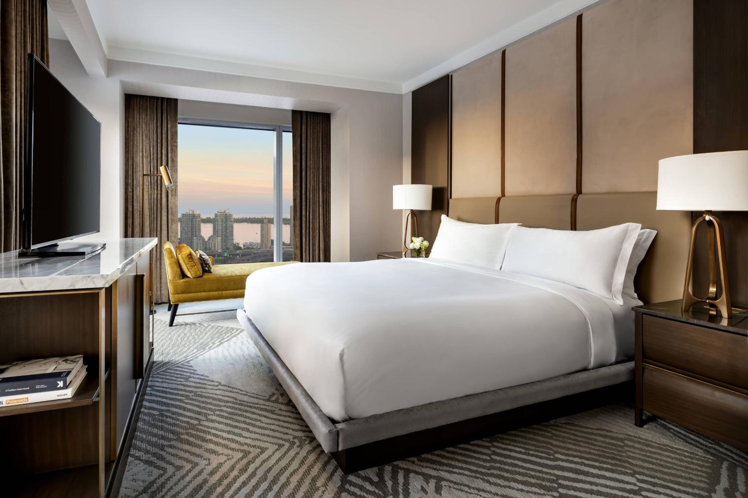 Club Lounge Access City View Corner Suite -1 King bed, living room with sofabed thumbnail 5