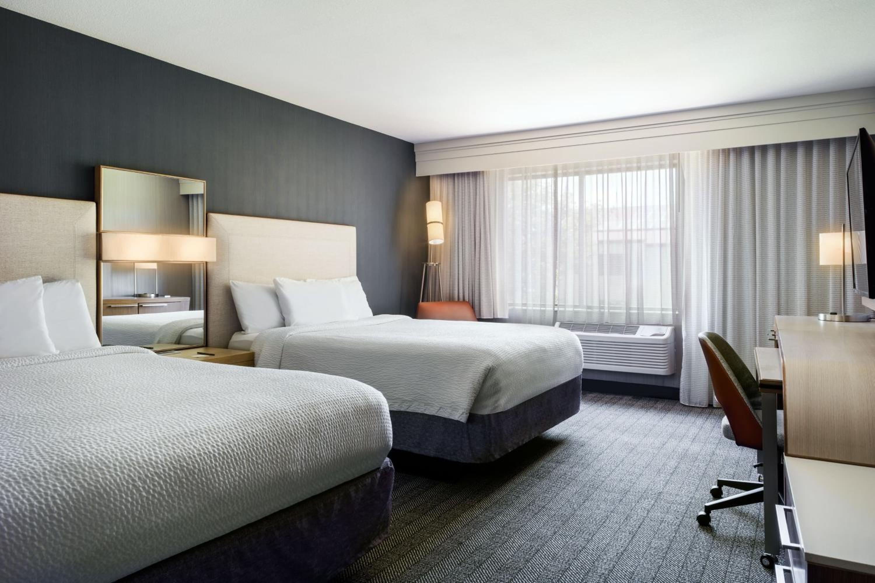 Queen Room with Two Queen Beds - Photo 1