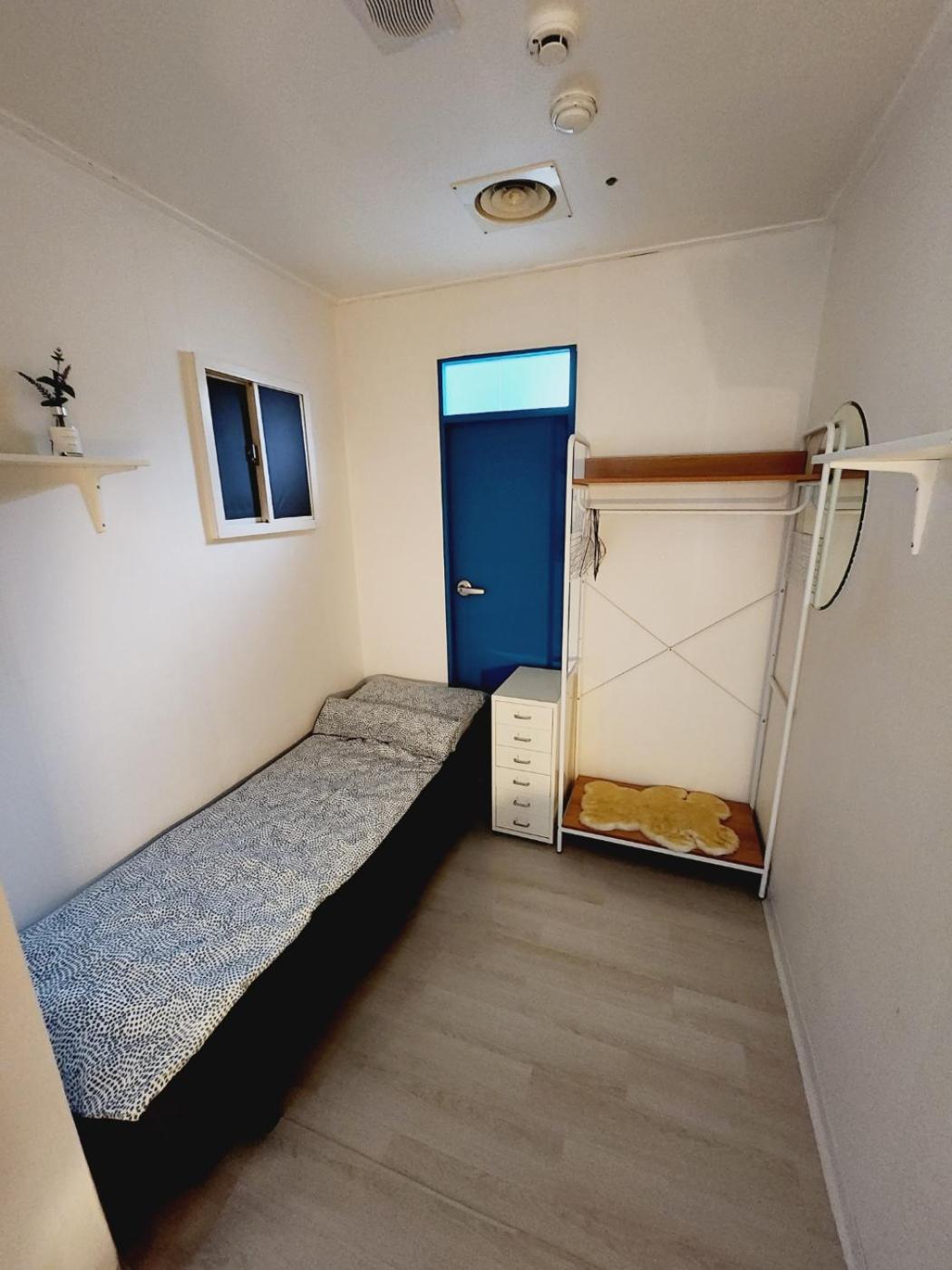 Single Room With Shared Shower And Toilet