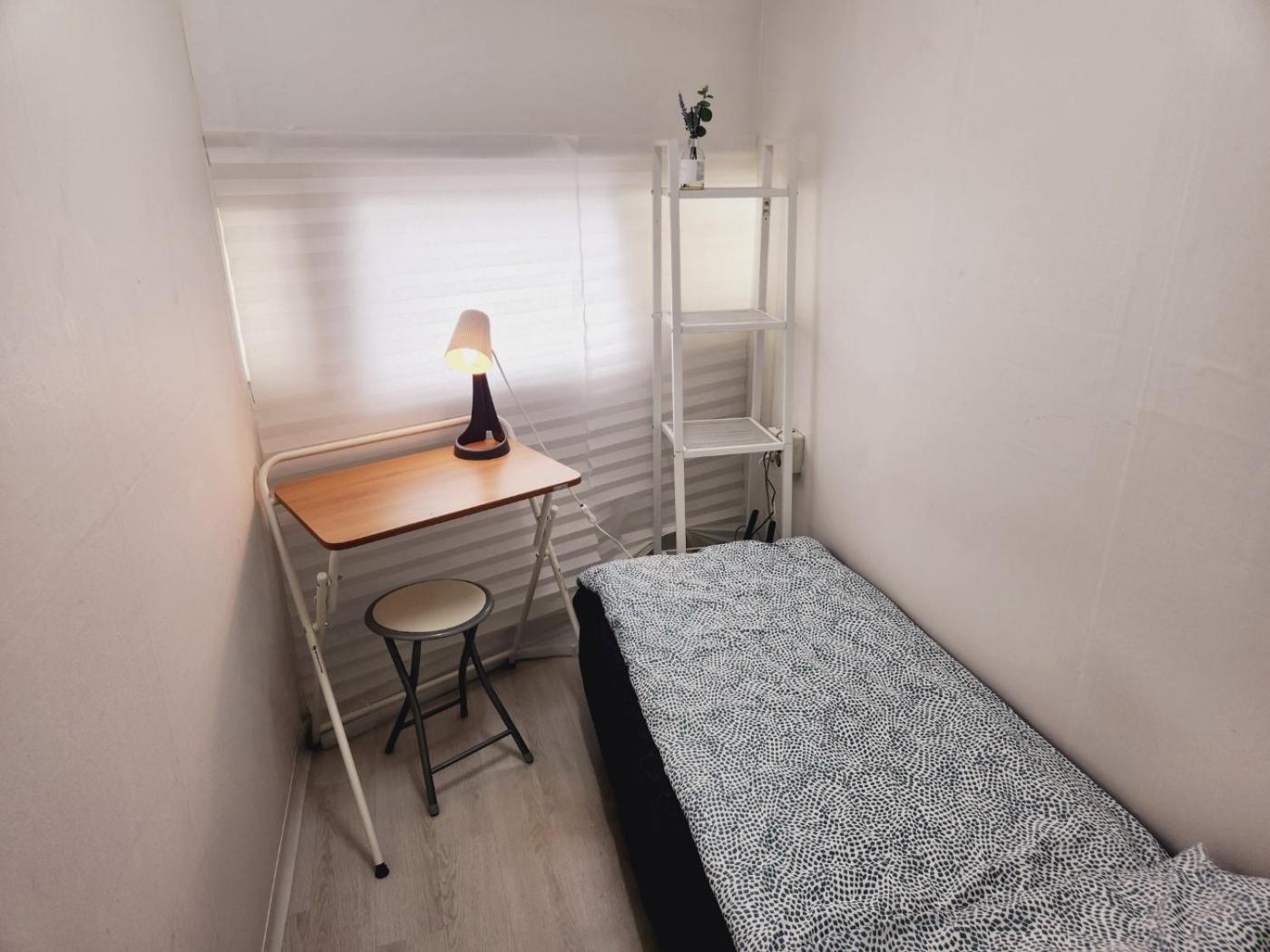 Single Room With Shared Shower And Toilet