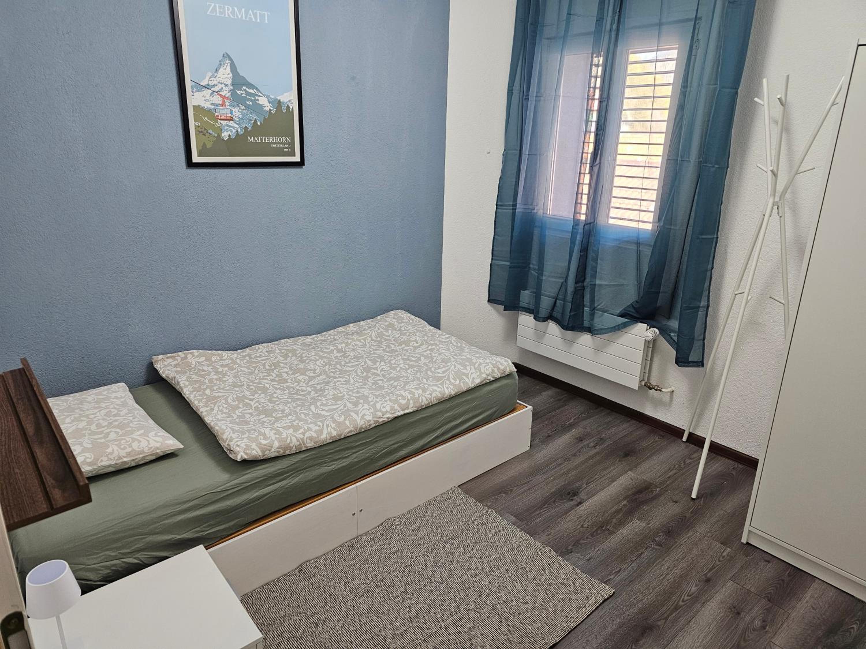 Three-Bedroom Apartment photo 2