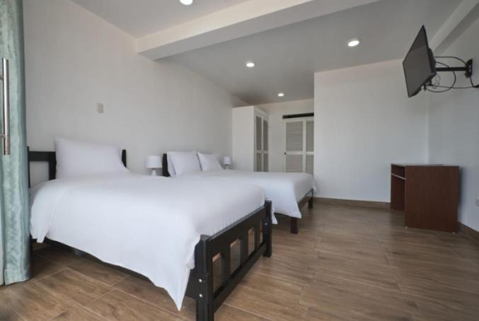 Deluxe Room (2 Adults + 1 Child) photo 1