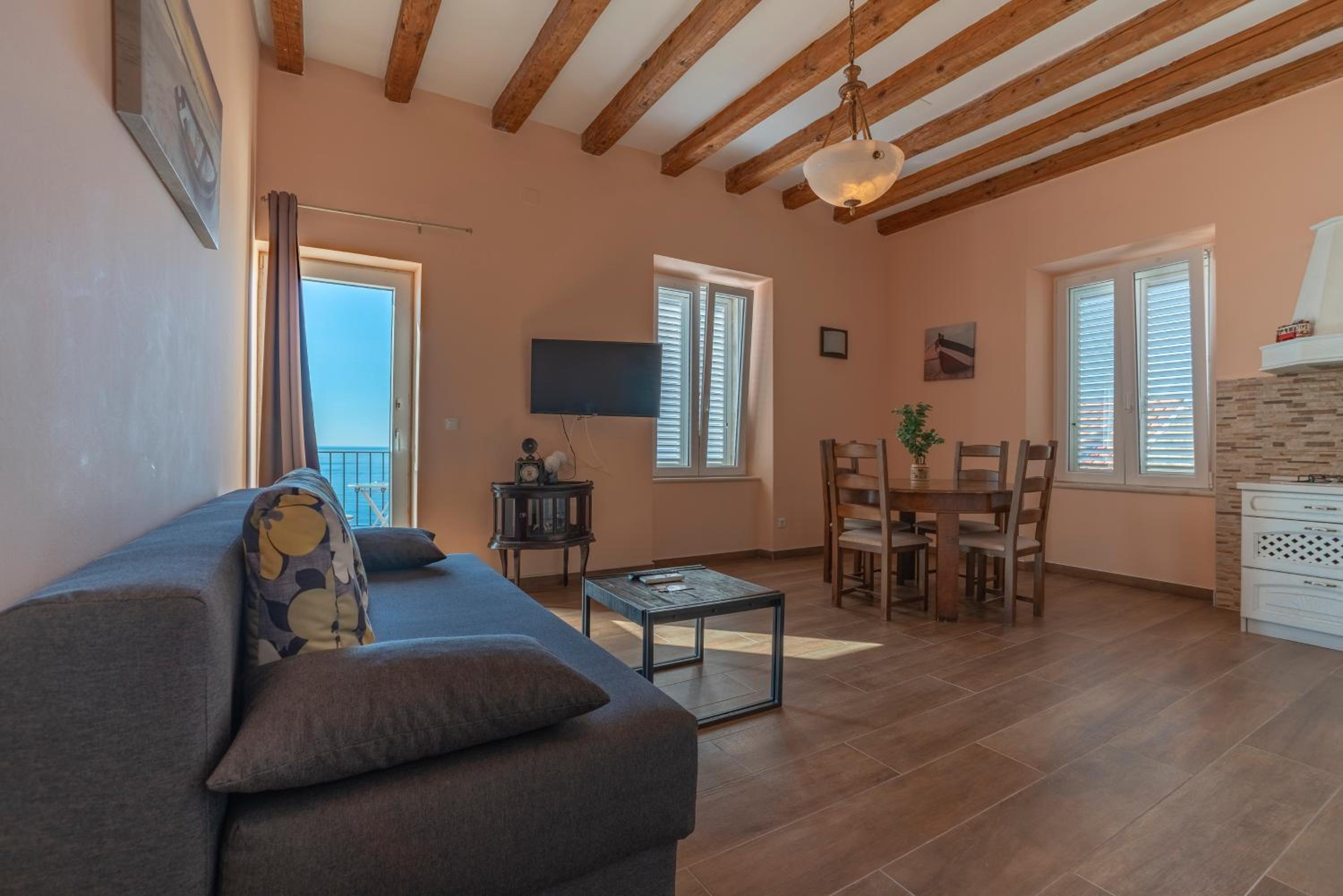One-Bedroom Apartment with Balcony and Sea View