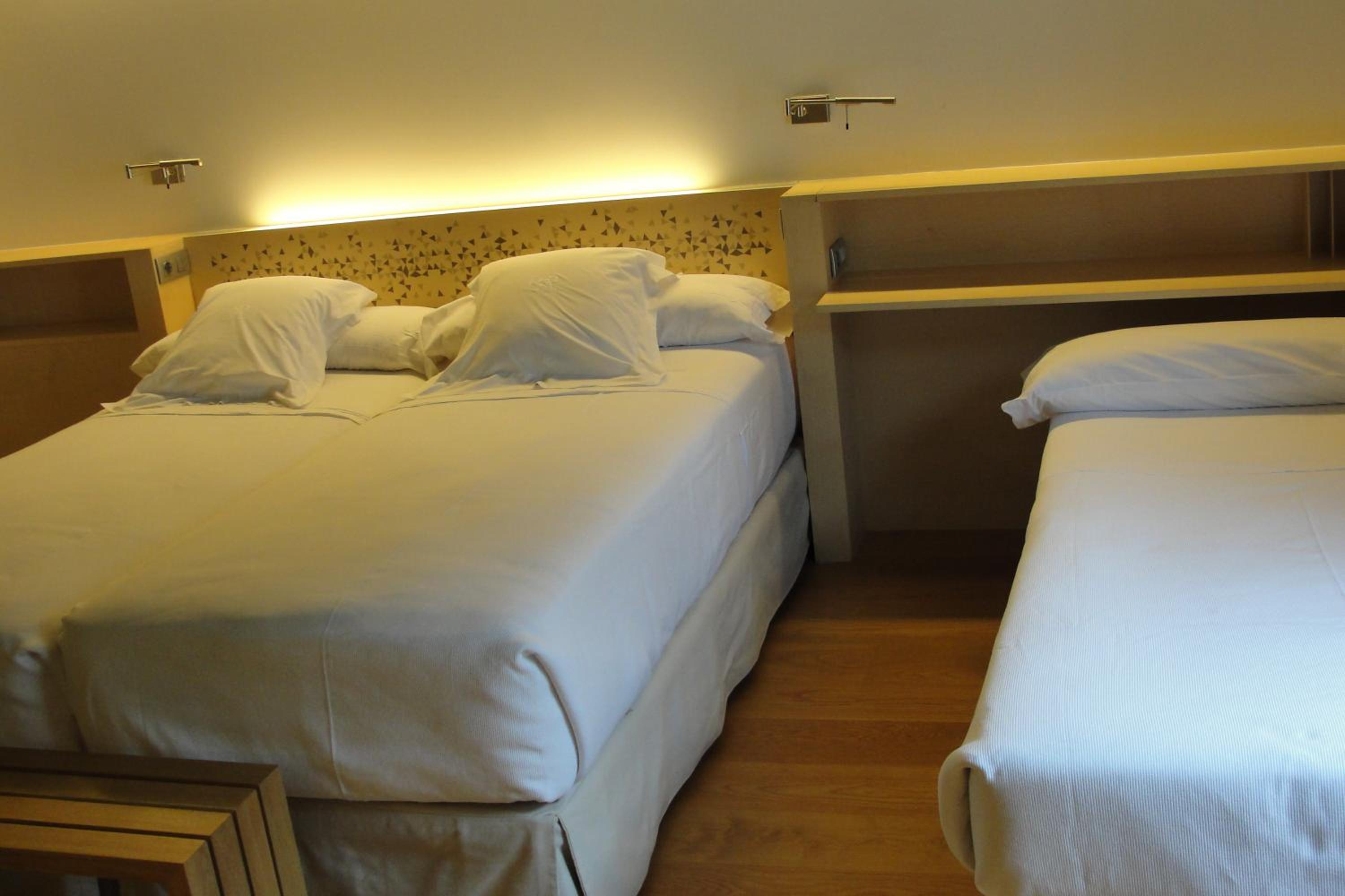 Habitación triple (2 adultos + 1 niño)