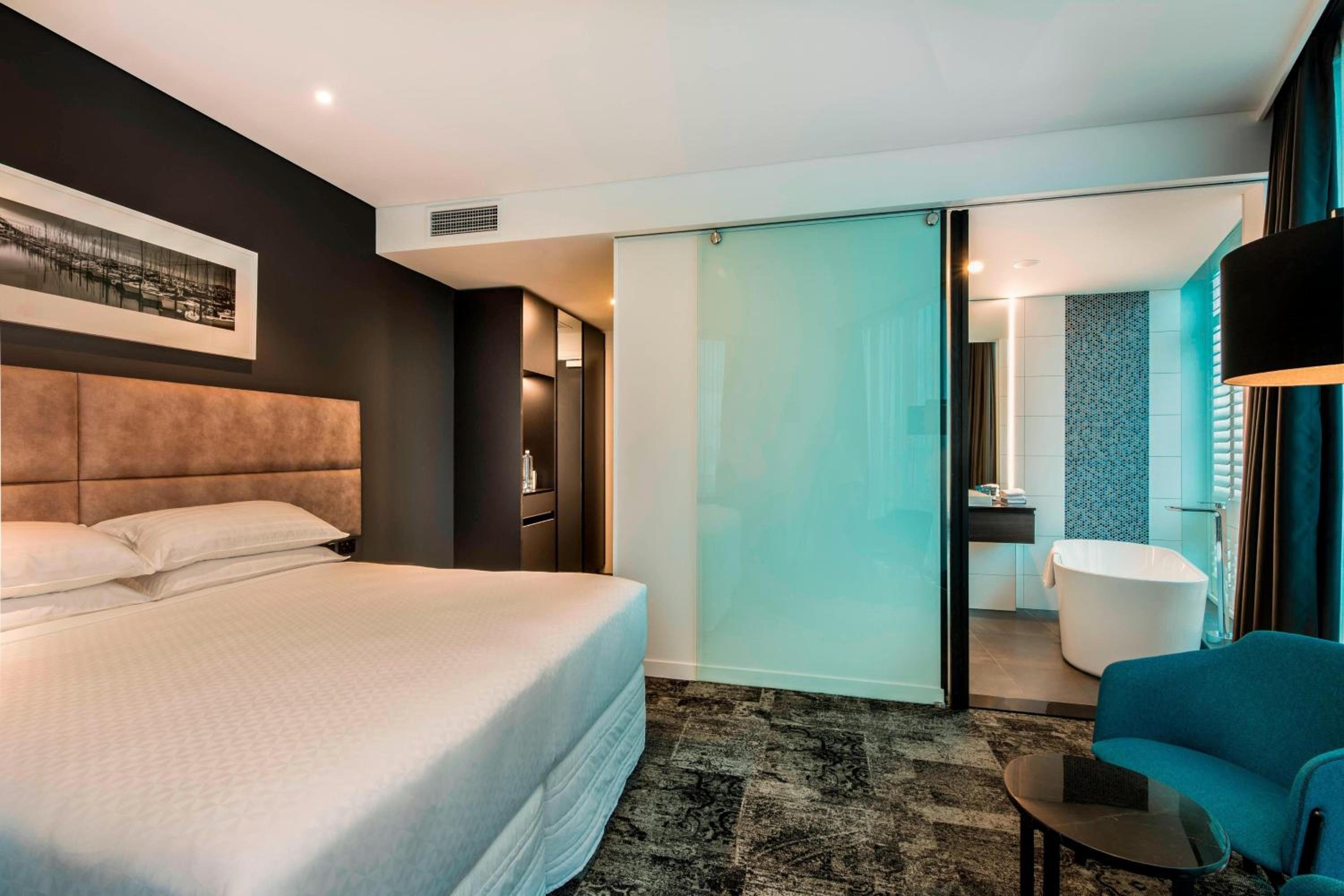 Corner Room with King Bed and City View