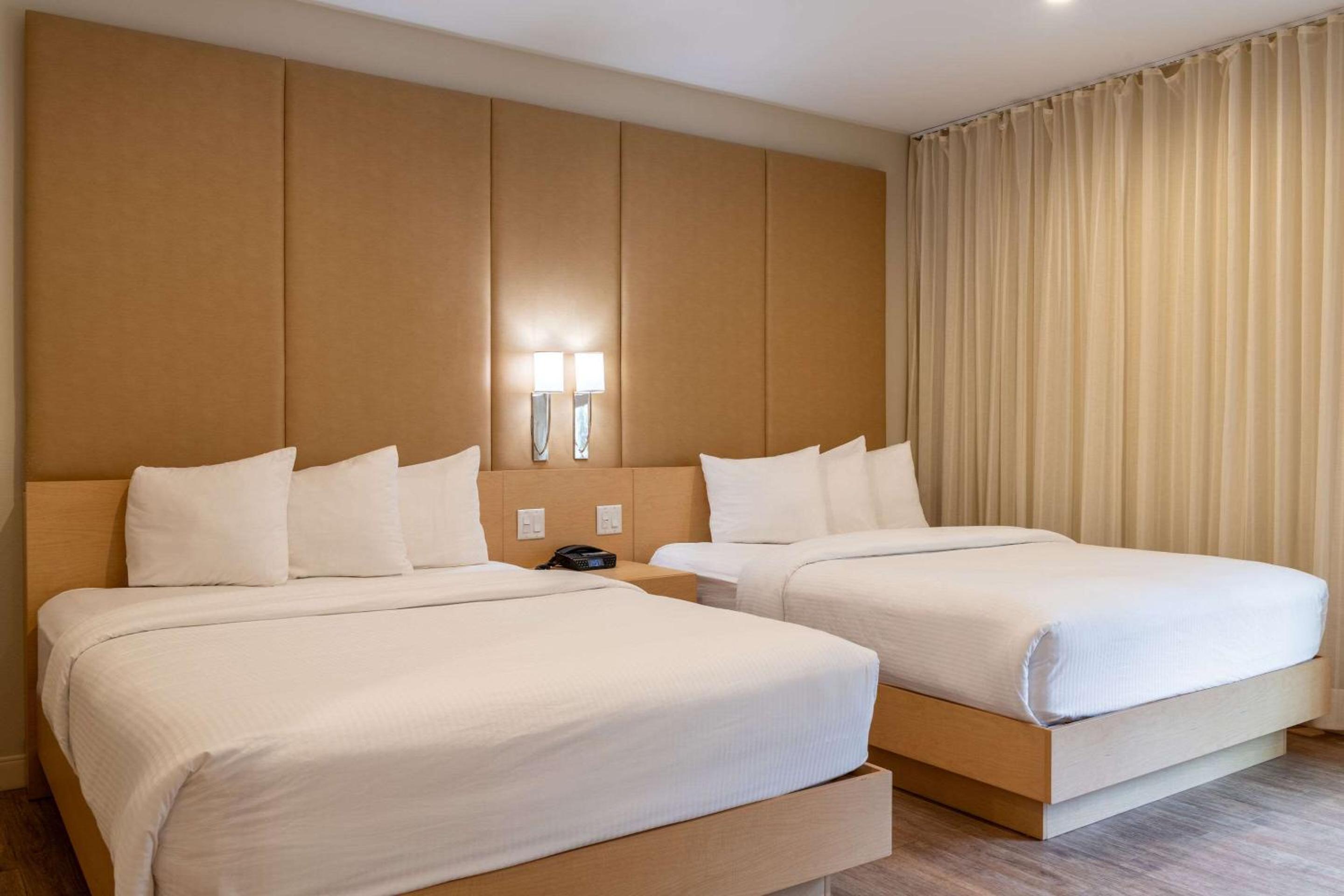 Efficiency Queen Suite with Two Queen Beds - Non-Smoking photo 1