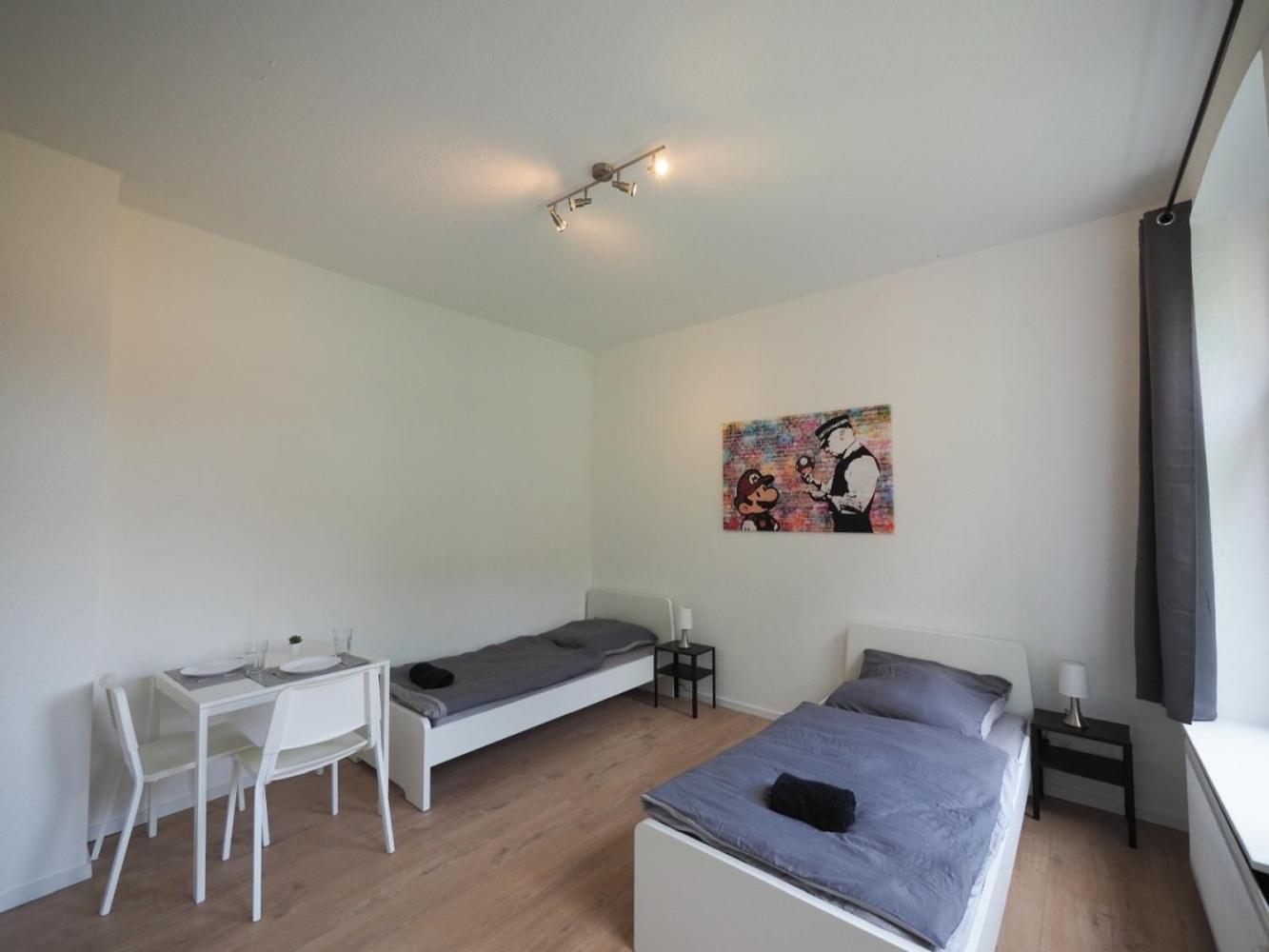 Three-Bedroom Apartment photo 1