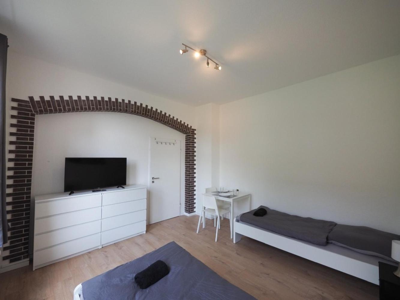 Three-Bedroom Apartment photo 2