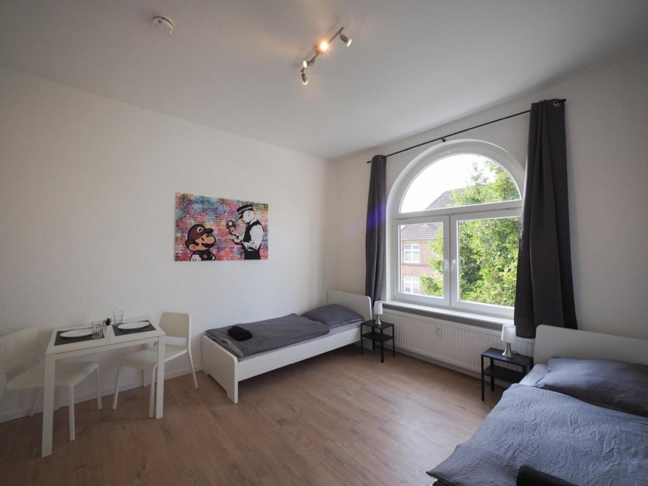 Three-Bedroom Apartment photo 1