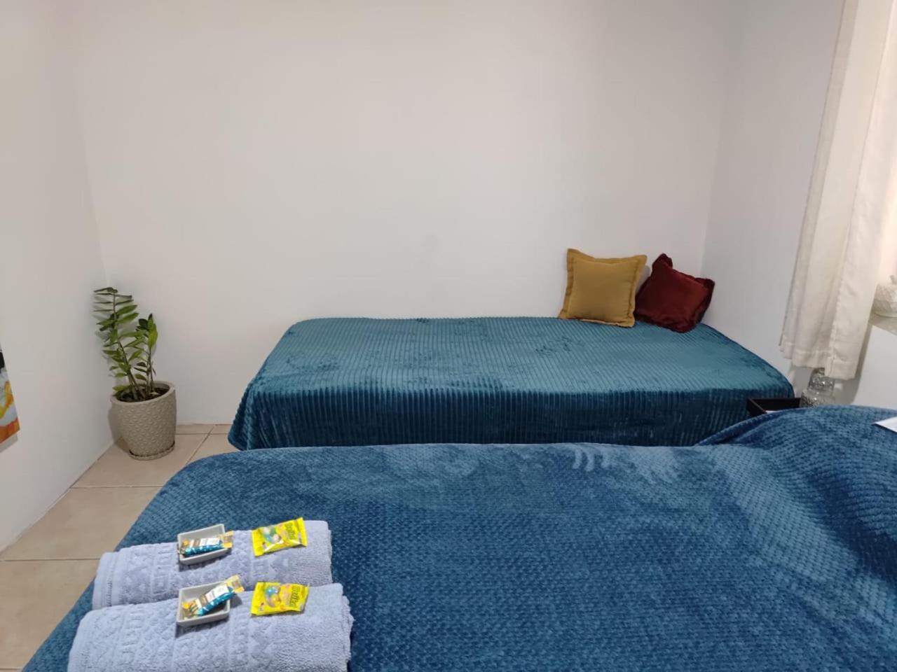 Basic Triple Room With Shared Bathroom