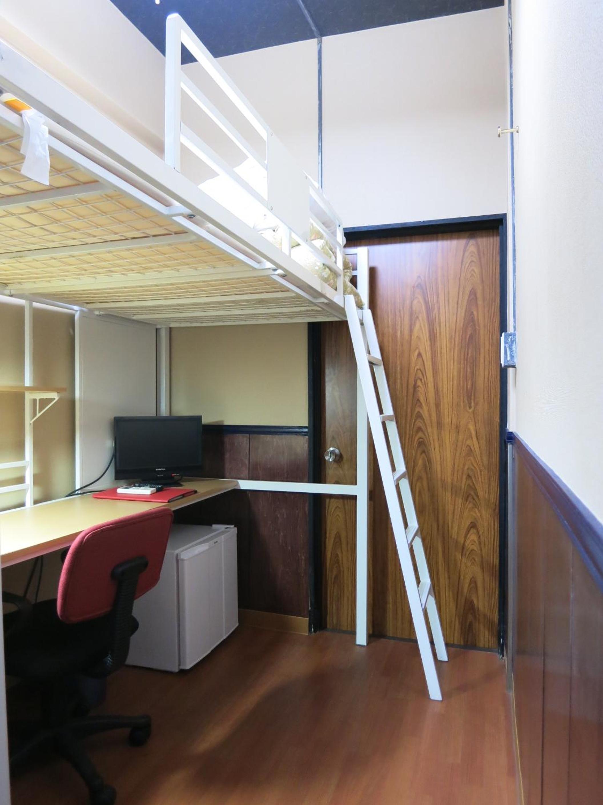 Single Bed in Male Dormitory Room photo 1