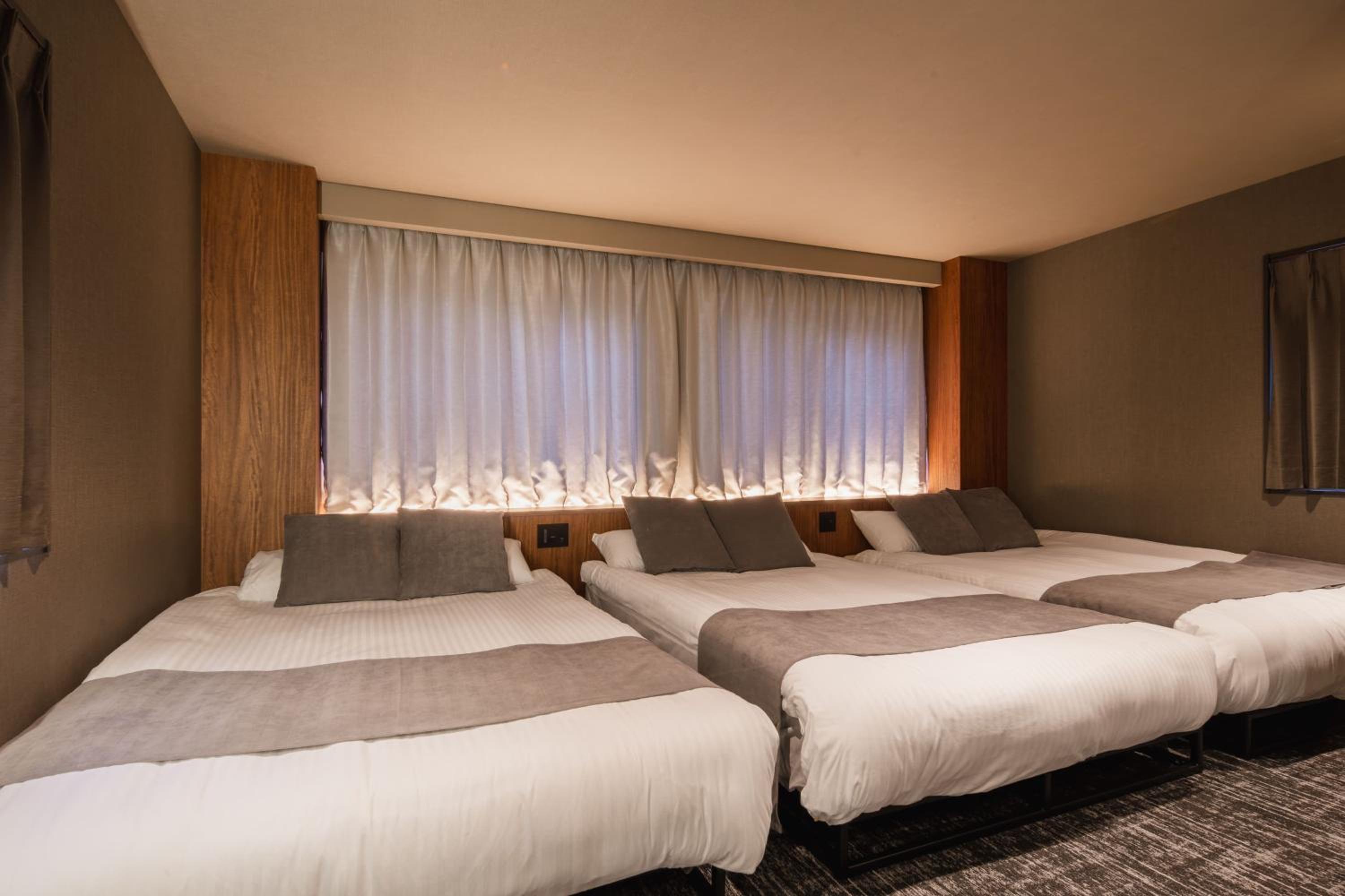 Deluxe Triple Room - Photo 20