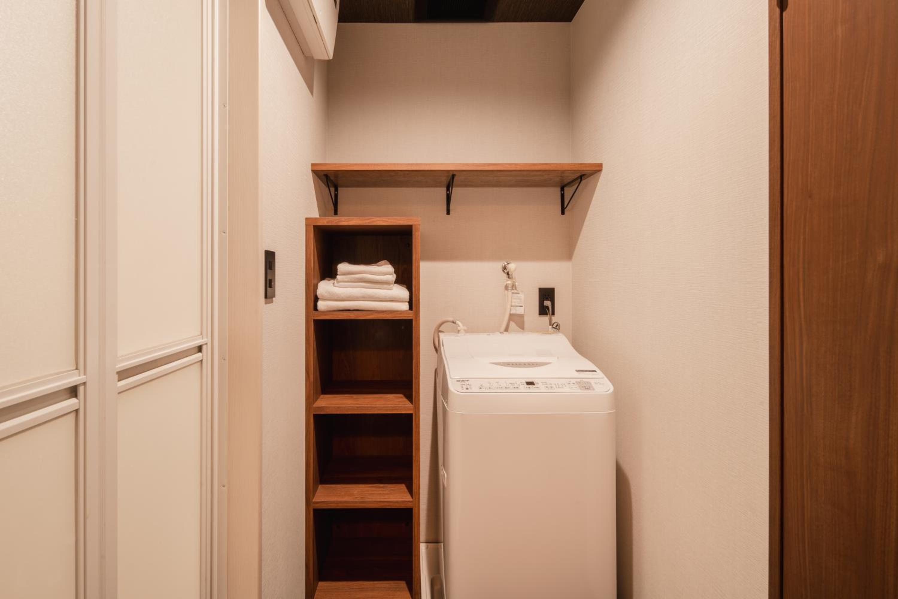 Deluxe Triple Room - Photo 12