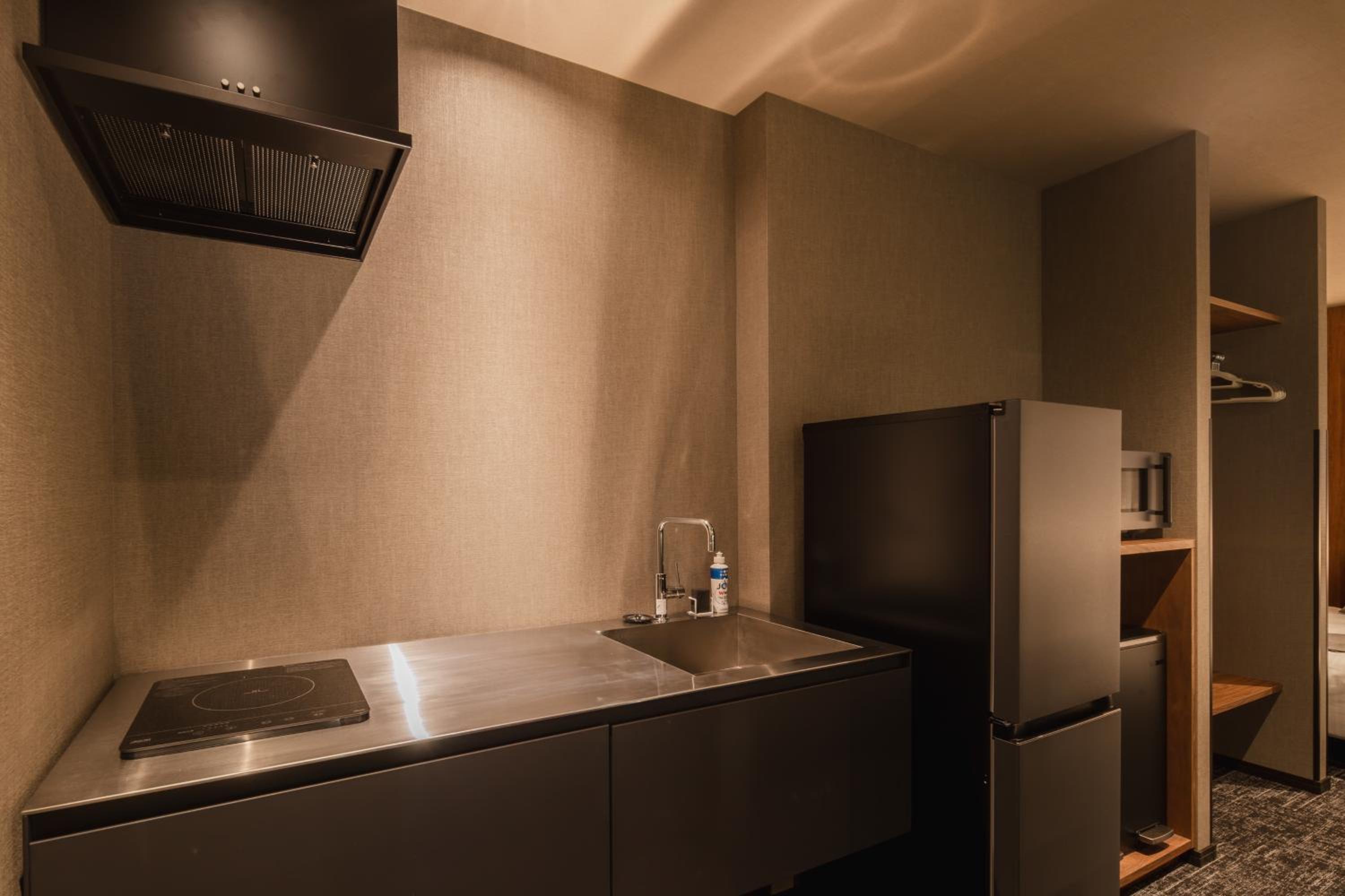 Deluxe Triple Room - Photo 9