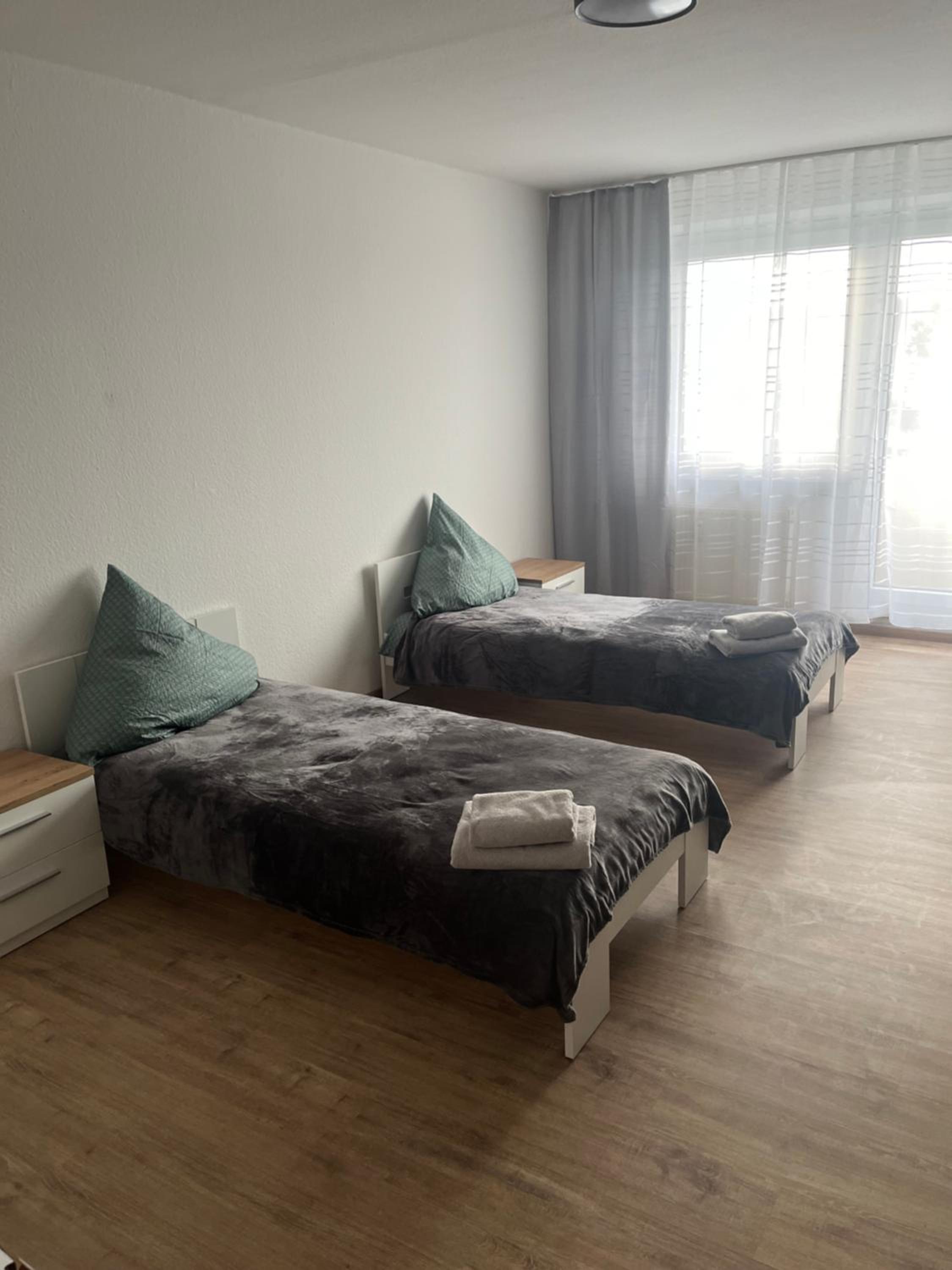 Three-Bedroom Apartment photo 1