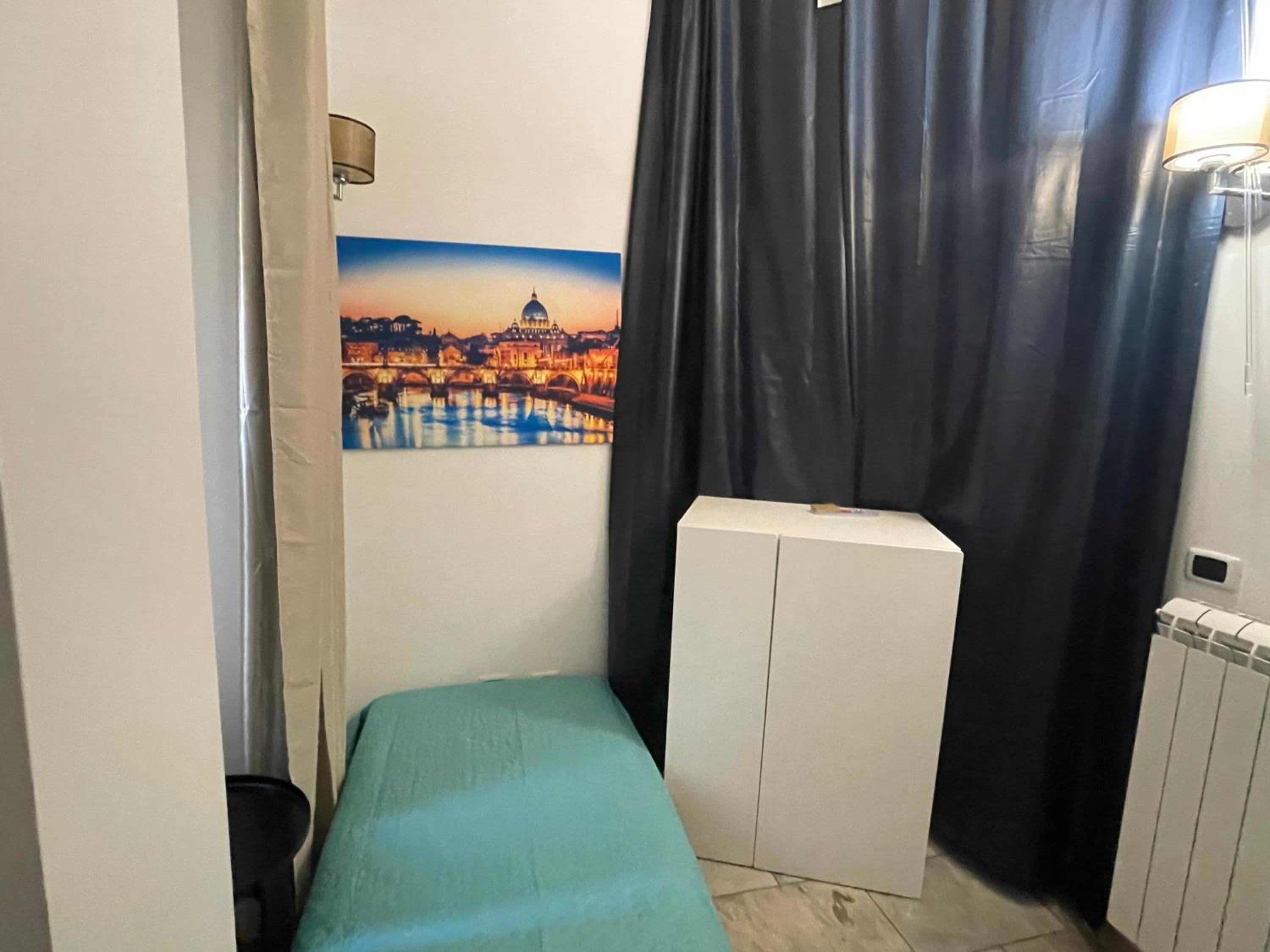 Single Bed in Dormitory Room