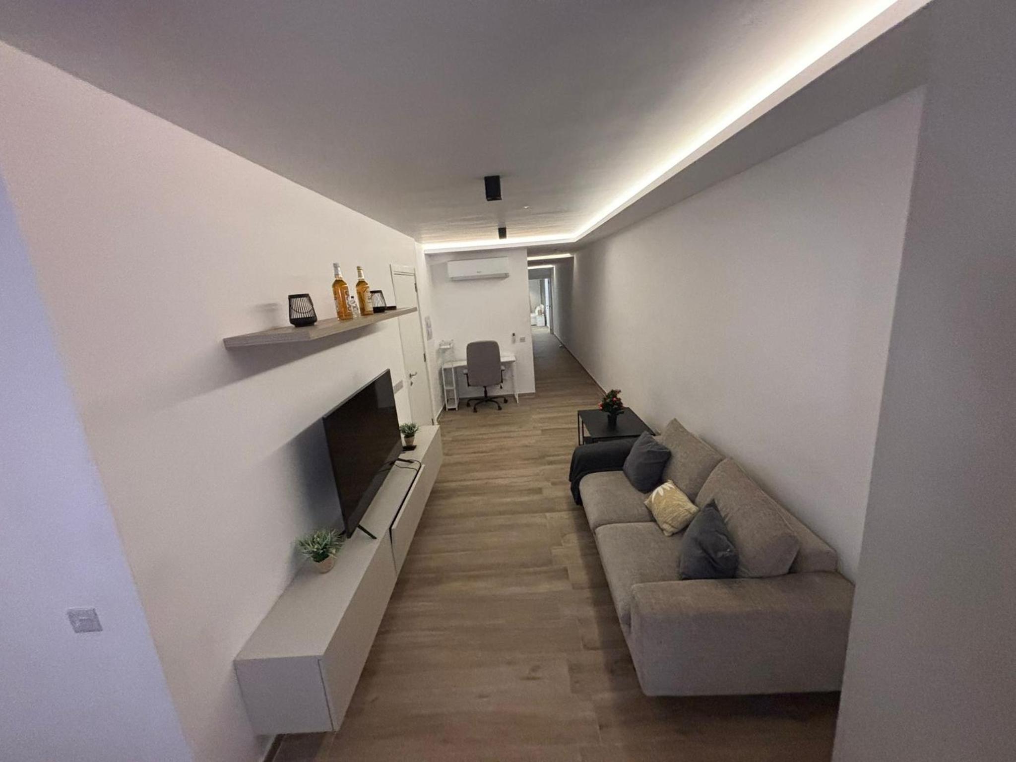 Three-Bedroom Apartment photo 1