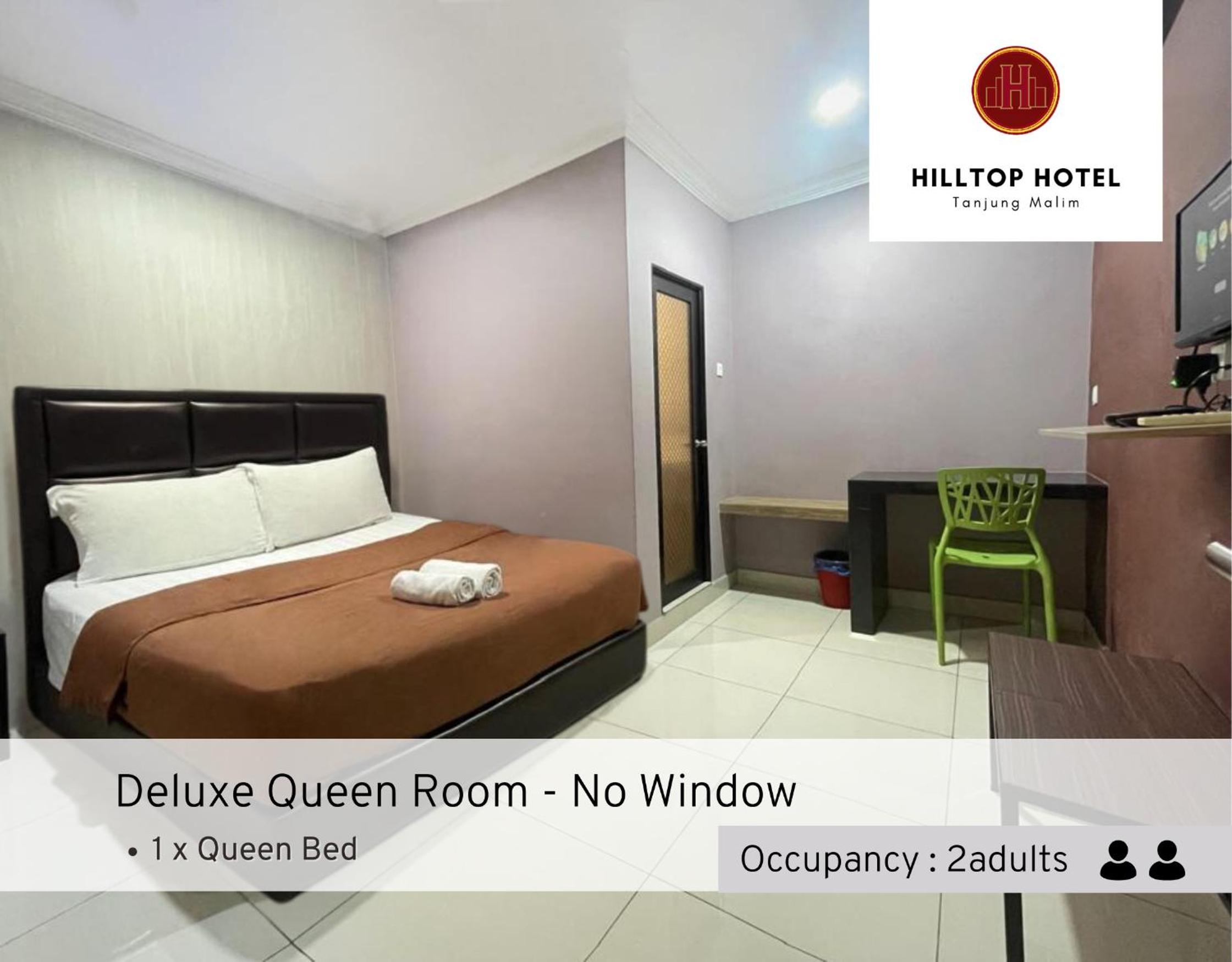 Deluxe Queen - No Window photo 1