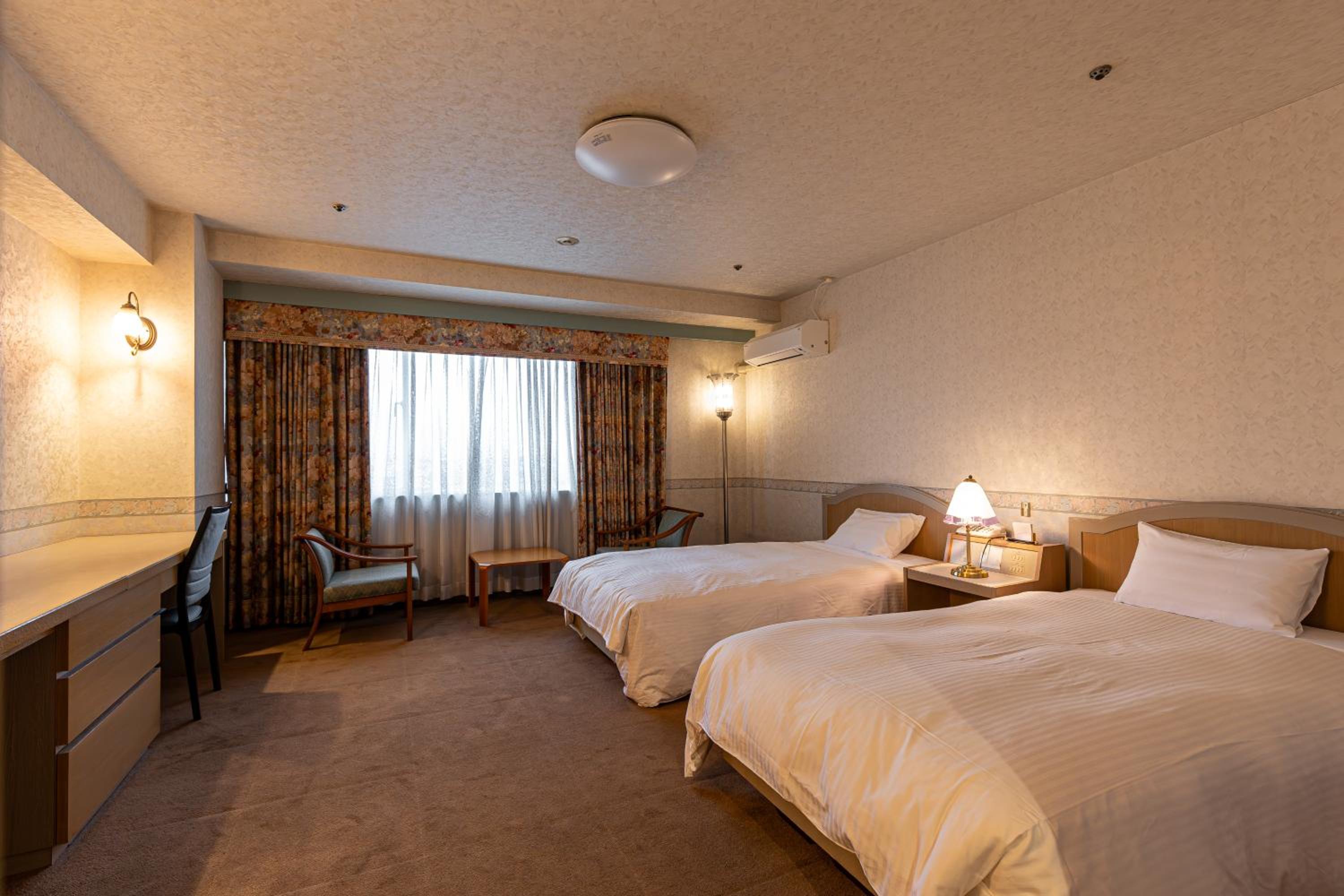 Twin Room - Photo 1