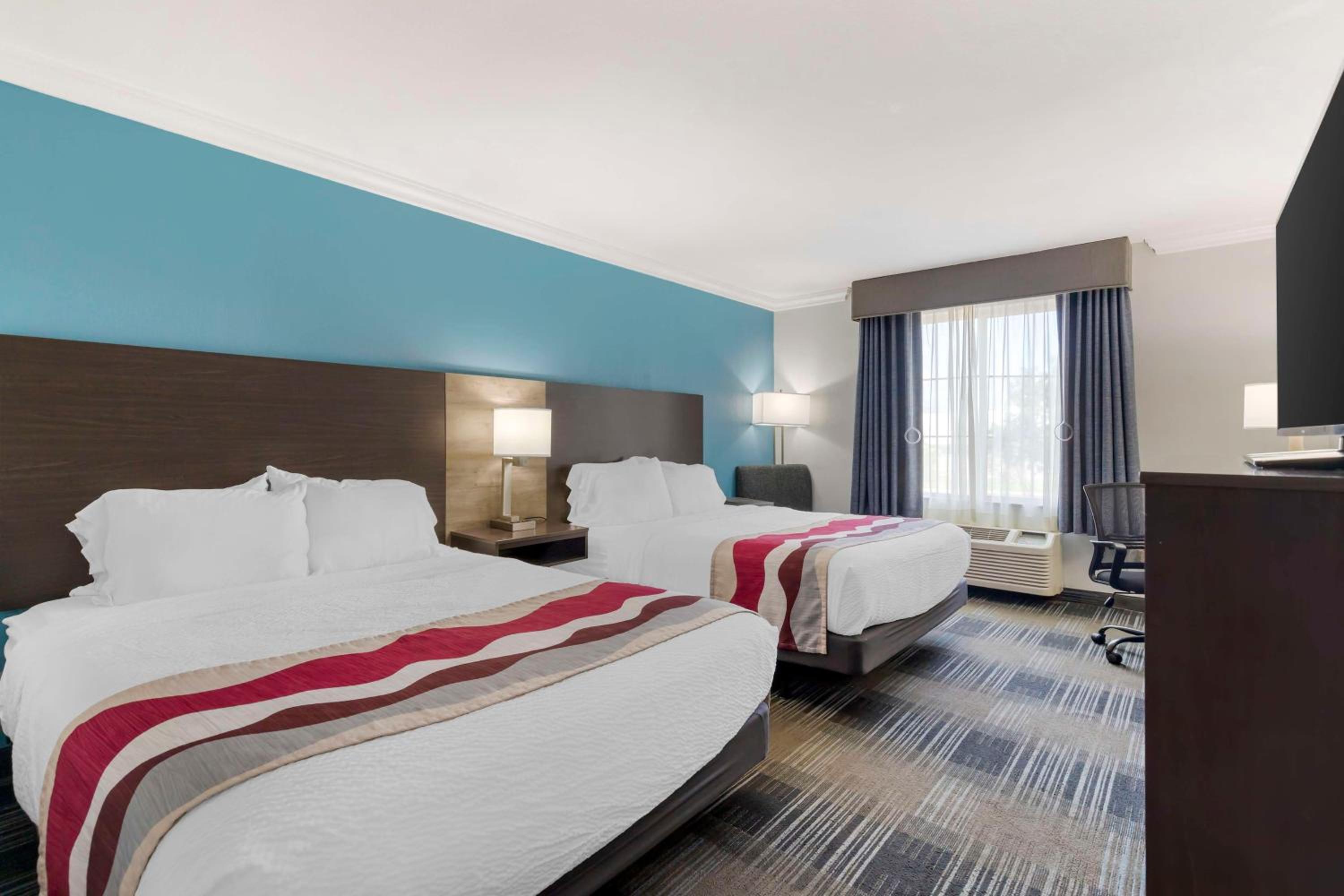 Queen Room with Two Queen Beds and Mobility Accessible Bathtub - Photo 1