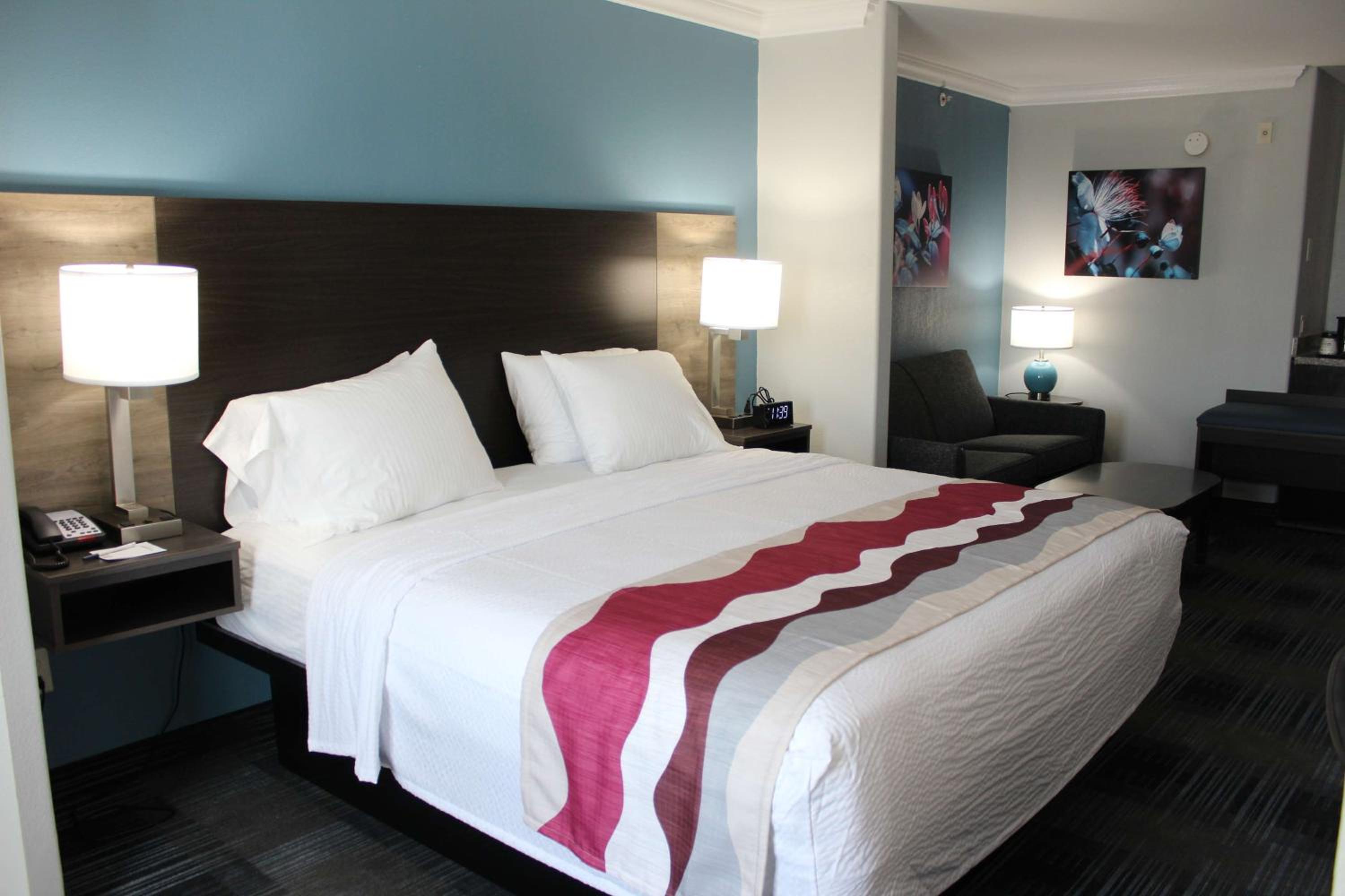 One-Bedroom Suite with One King and One Queen Bed and Full Kitchen - Photo 2